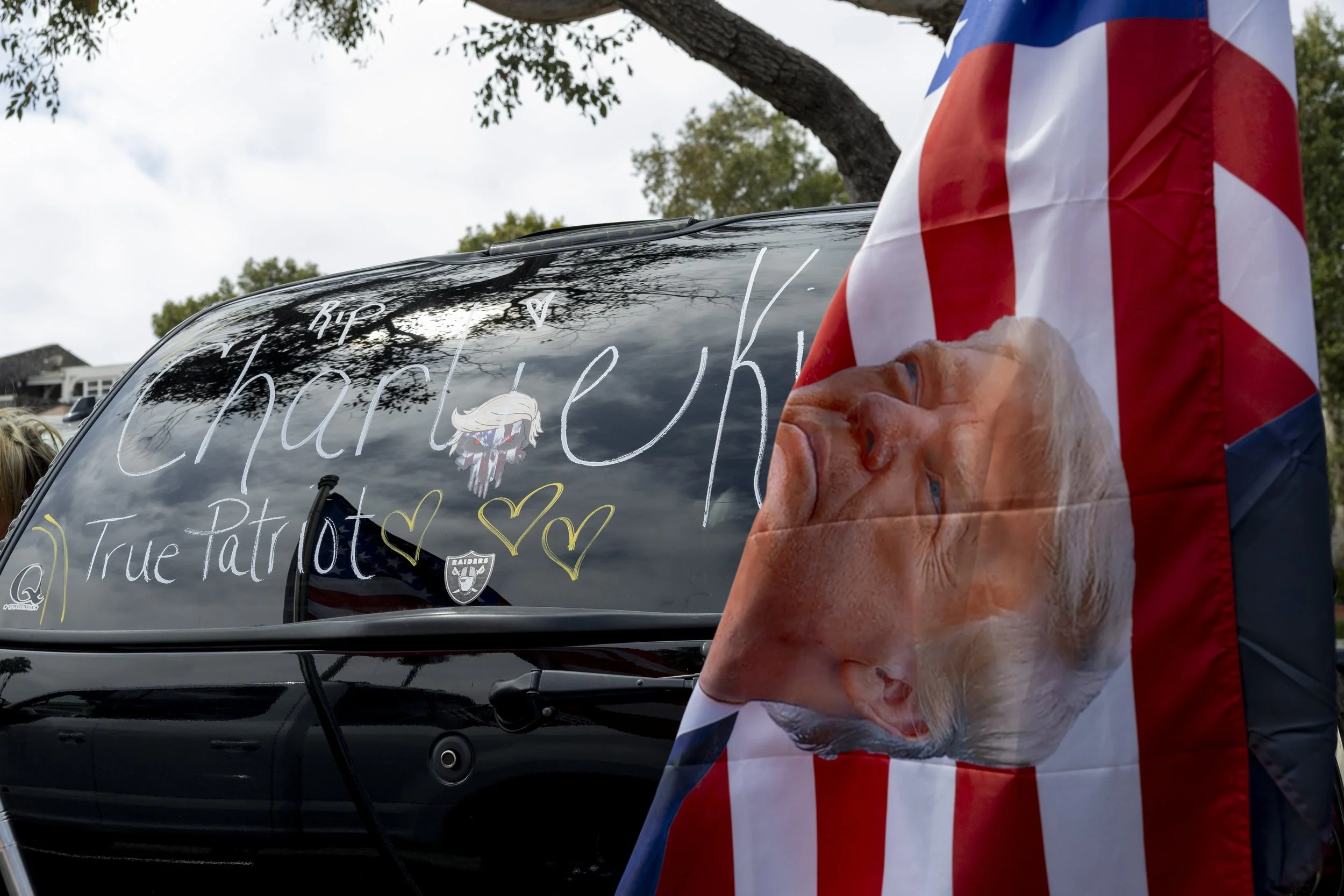 A message displaying “Rip Charlie Kirk, true patriot” was written on a cars vehicle during the 805 Patriots, a pro-Maga group, gathering at Point Hueneme, Calif., on Saturday, Sept. 13, 2025, after a remembrance cruise dedicated to the victims of 9/