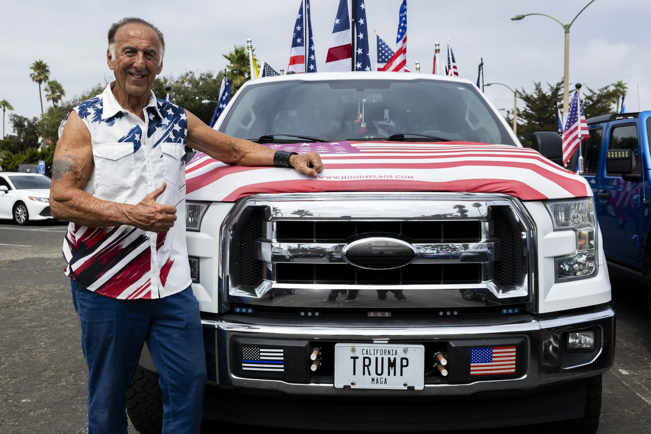 Jerry Piani, a member of the 805 Patriots, a pro-Maga group, poses with his Trump-themed truck at Point Hueneme, Calif., on Saturday, Sept. 13, 2025, during a remembrance cruise dedicated to the victims of 9/11 and Charlie Kirk.(Jake Crandall | The