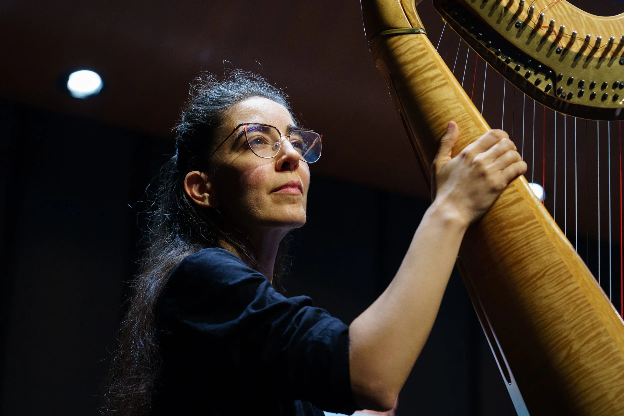 Cristina Montes Mateo, principal harp, dress rehearses Orchestra Santa Monica’s "Classical Jukebox" program for the same day's performance at BroadStage on September 7, 2025 in Santa Monica, Calif. (Elizabeth Bacher | The Corsair)