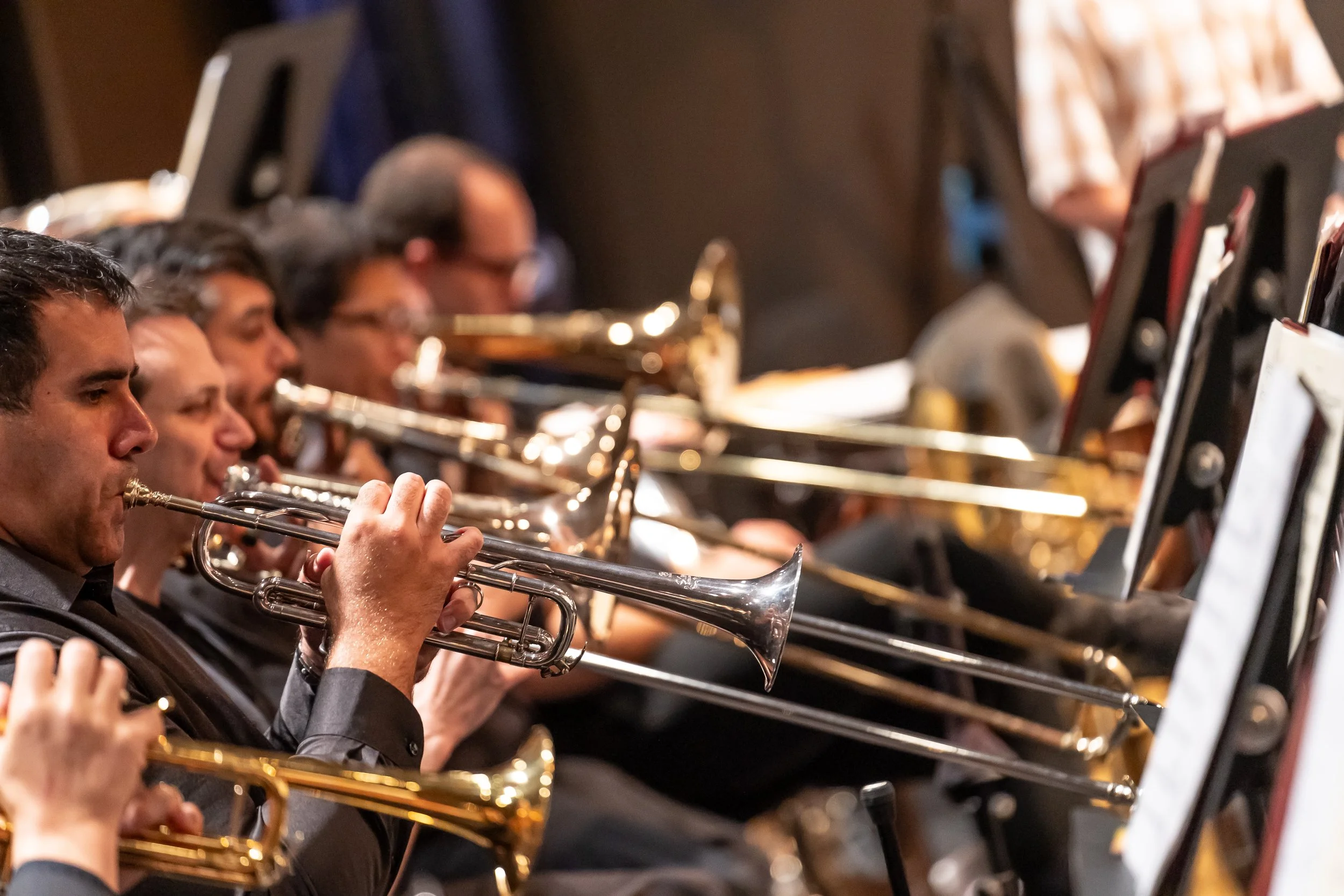(L to R) Adam Bhatia, principal trumpet, Noah Gladstone, principal trombone, Adrian Reyes, trombone, David Goya, trombone, dress rehearse Orchestra Santa Monica’s "Classical Jukebox" program for the same day's performance at BroadStage on September