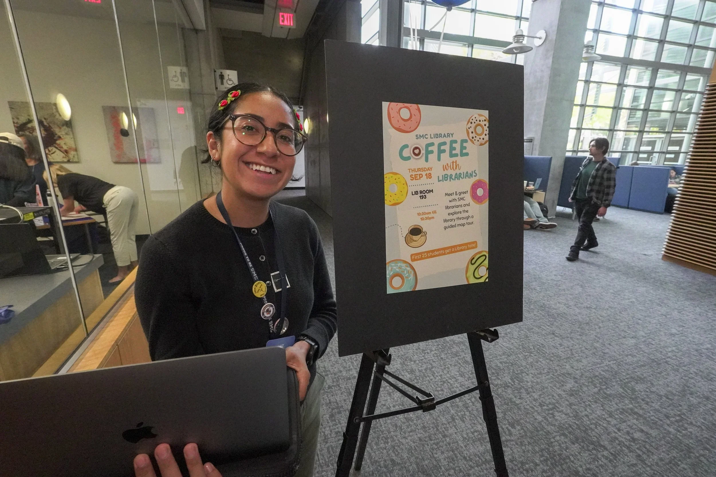 Luz Badillo, Reference and Instruction Librarian at Santa Monica College (SMC) greeted students arriving at the Coffee with Librarians event on Thursday, Sept. 18, 2025 at SMC, in Santa Monica, Calif. The event enabled librarians to connect with new