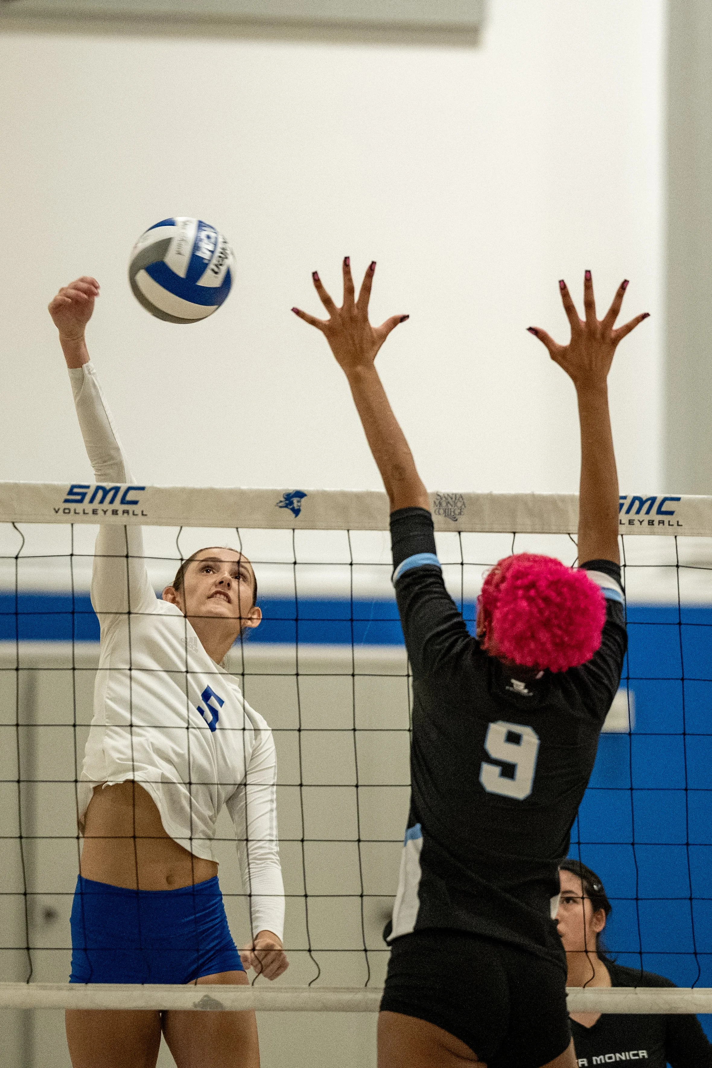 Santa Monica College (SMC) Corsair middle blocker (5) Nicole Lankton spiking the ball on Friday, September 19, 2025, Santa Monica,Calif. The Corsairs won the match 3-2. (Tom Rosholt | The Corsair)