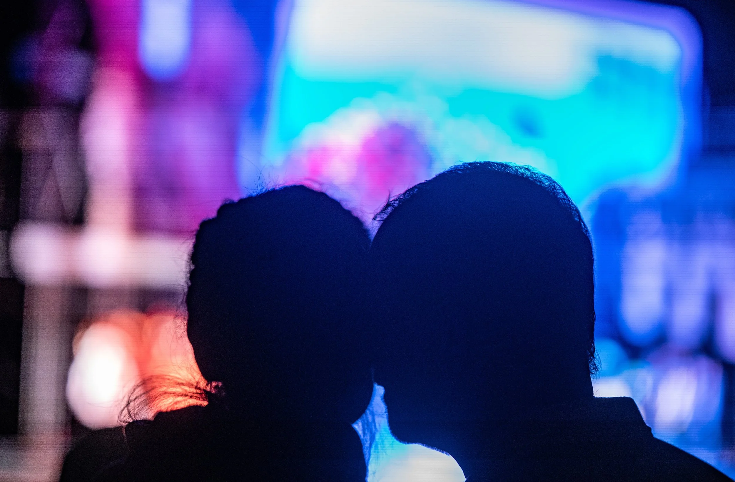 A couple watching the West Side Story performance on the jumbo screen on Saturday, September 27, 2025, Santa Monica,Calif. (Tom Rosholt | The Corsair)