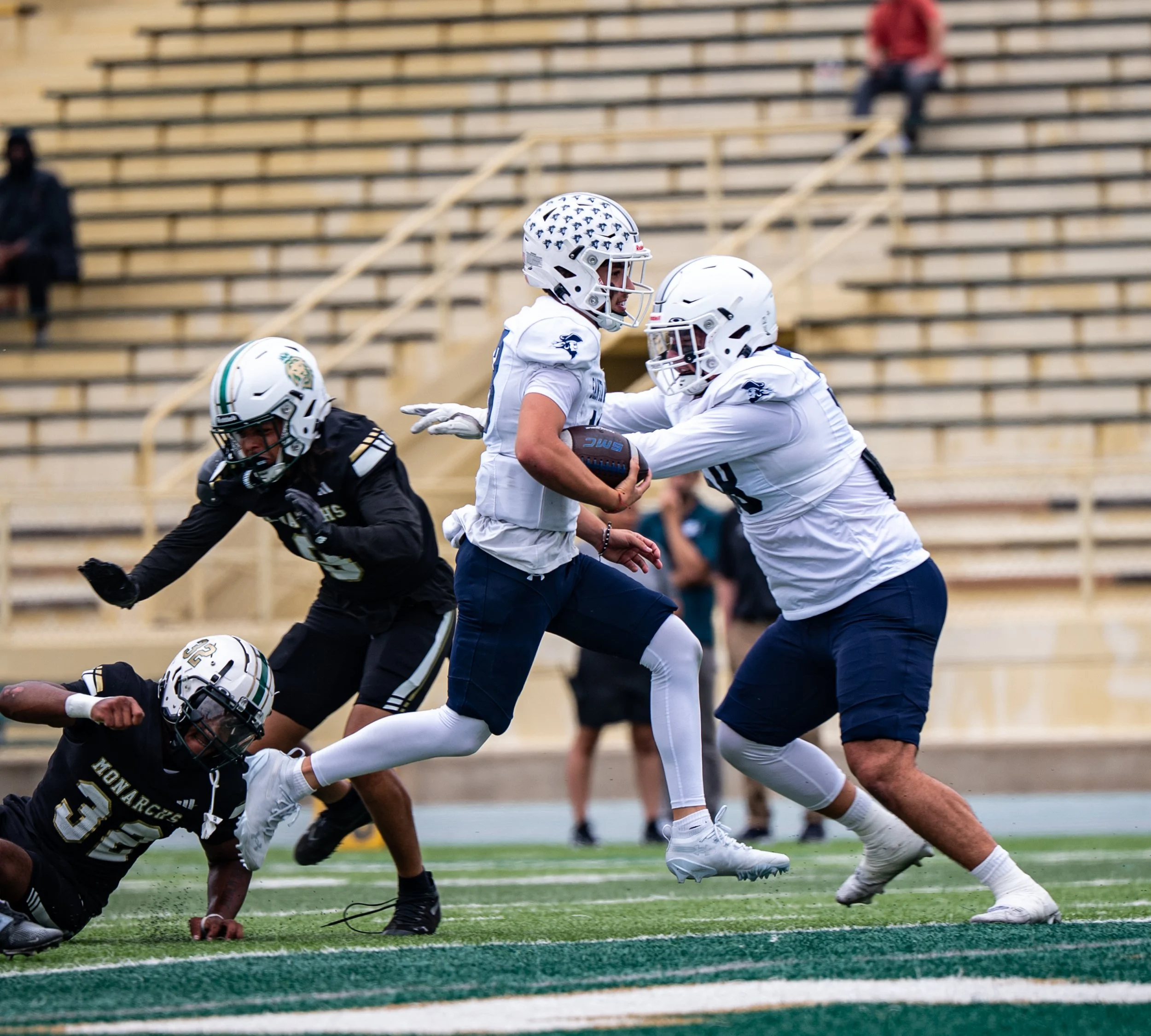 Santa Monica College (SMC) Corsair QB (13) Dylan Moreno runs for a 3 yard touchdown on Saturday, September 20, 2025, Valley Glenn,Calif. The Corsairs won 34-14. (Tom Rosholt | The Corsair)