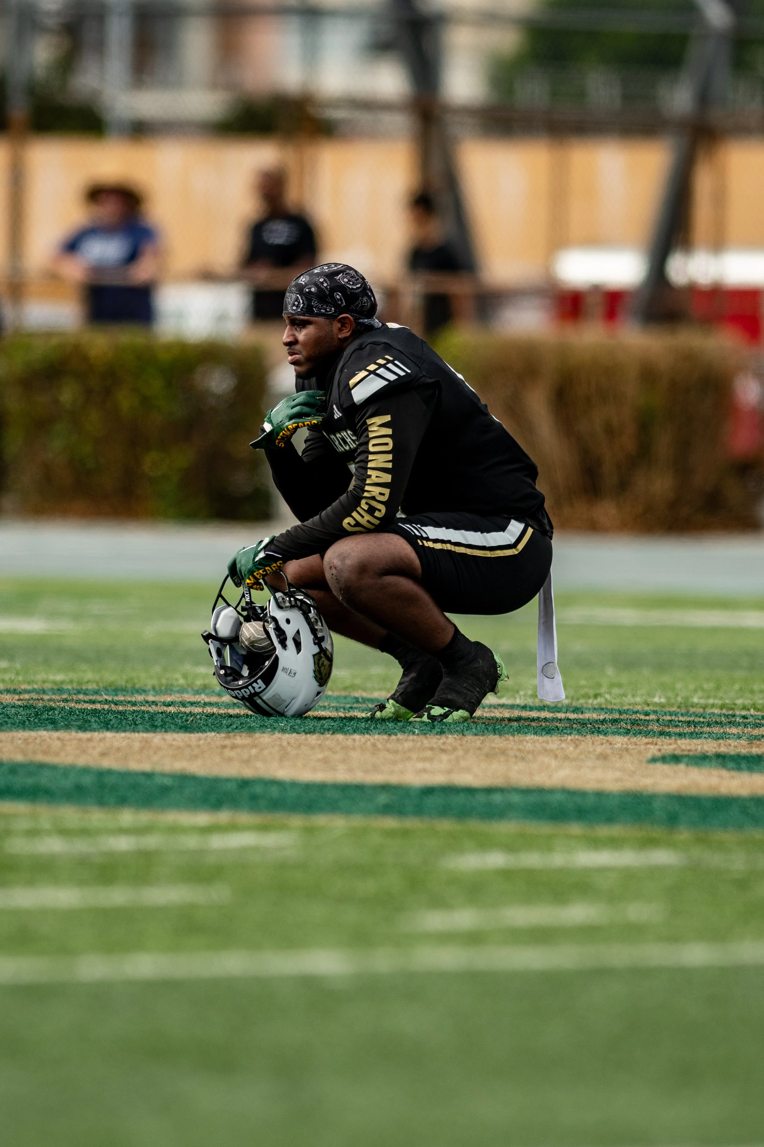 Valley College Monarch squanting watching paramedics taking injured WR (19) Jeremiah Green to the hospital on Saturday, September 20, 2025, Valley Glenn,Calif. The Corsairs won 34-14. (Tom Rosholt | The Corsair)