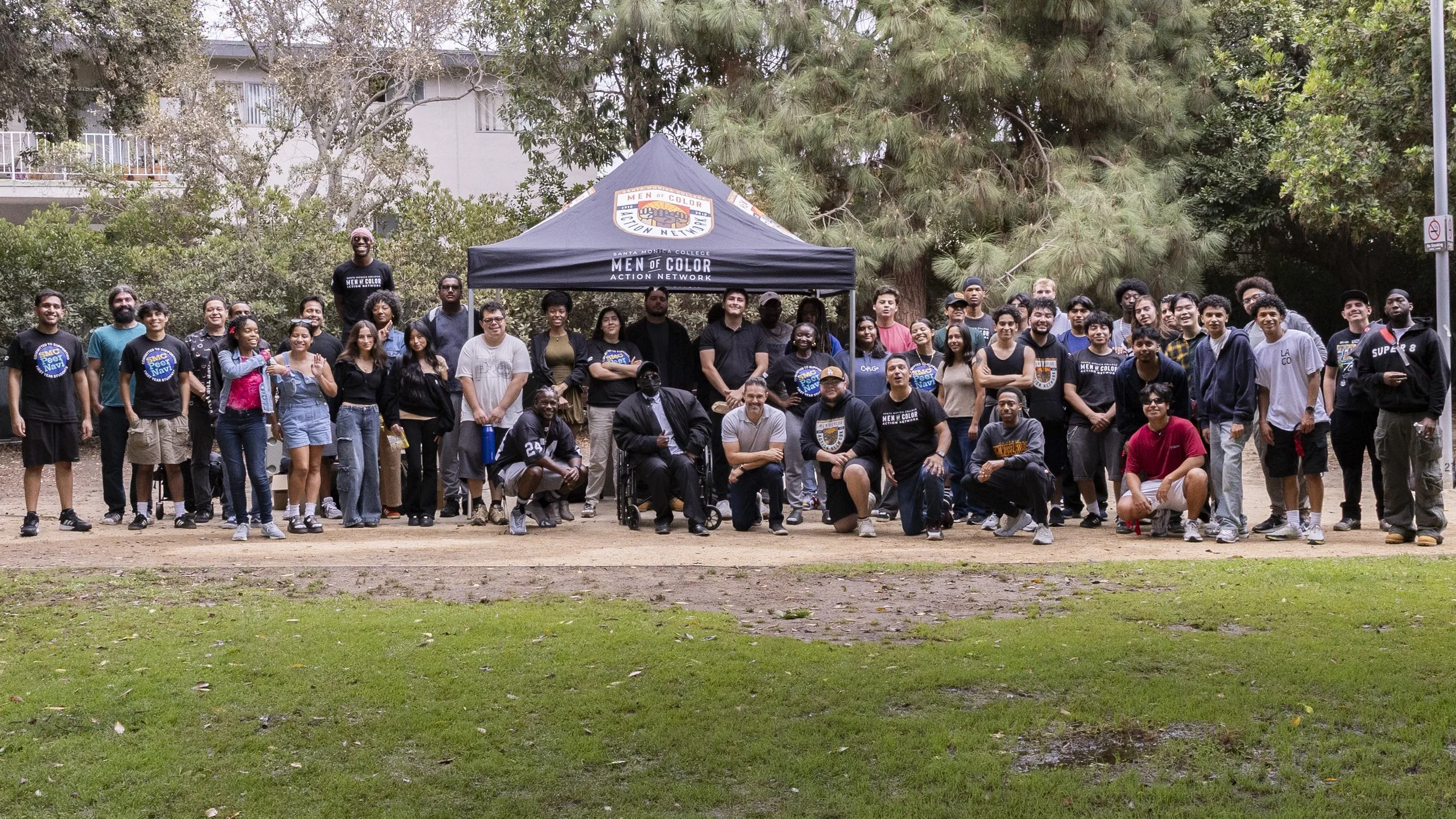 Santa Monica College students pose for a photo on Friday, Sept. 26, 2025, during a Men of Color Action Network barbecue. (Kayjel J. Mairena | The Corsair) 