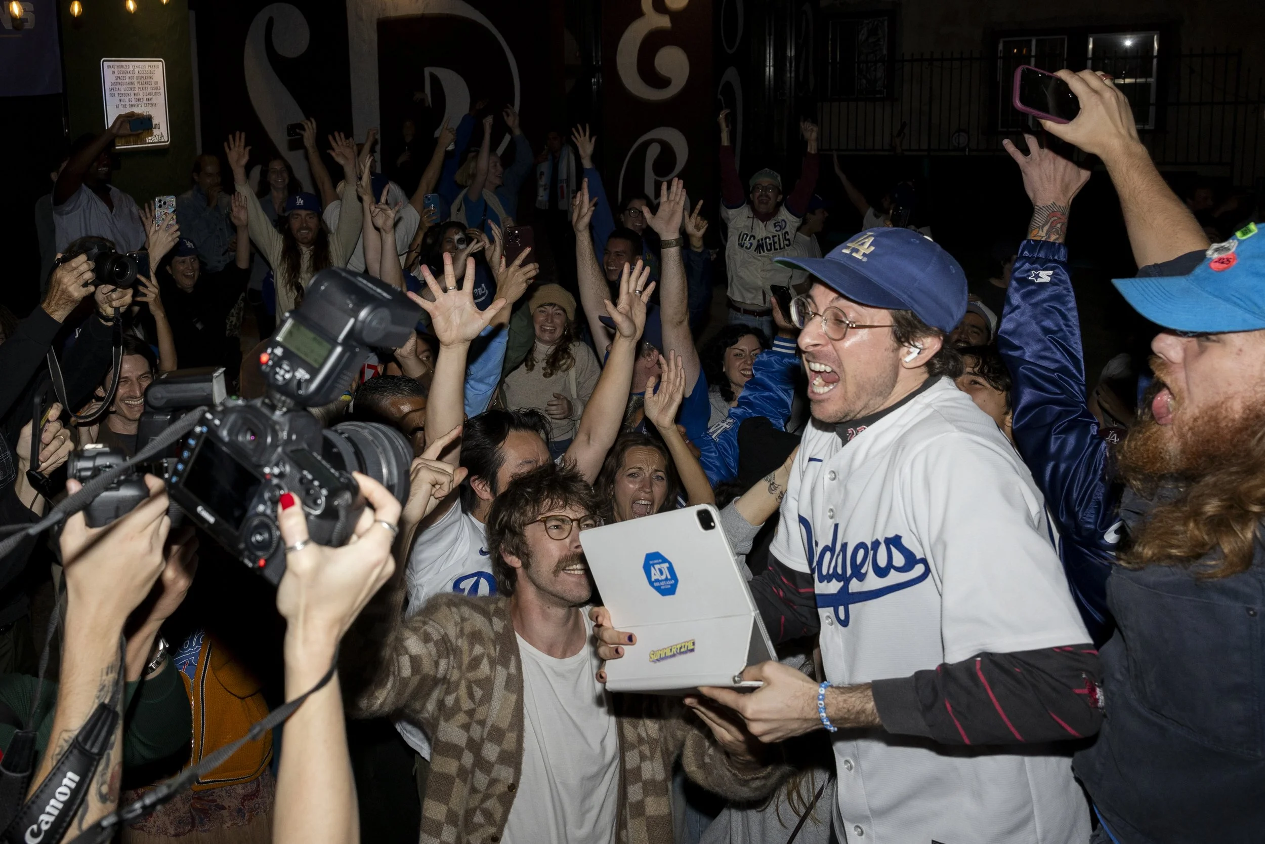  Dodgers fans celebrate the team winning the MLB World Series at the Douglas in Echo Park, Los Angeles, on Saturday, Nov.1, 2025, in a seven-game series. (Kayjel J. Mairena | The Corsair) 