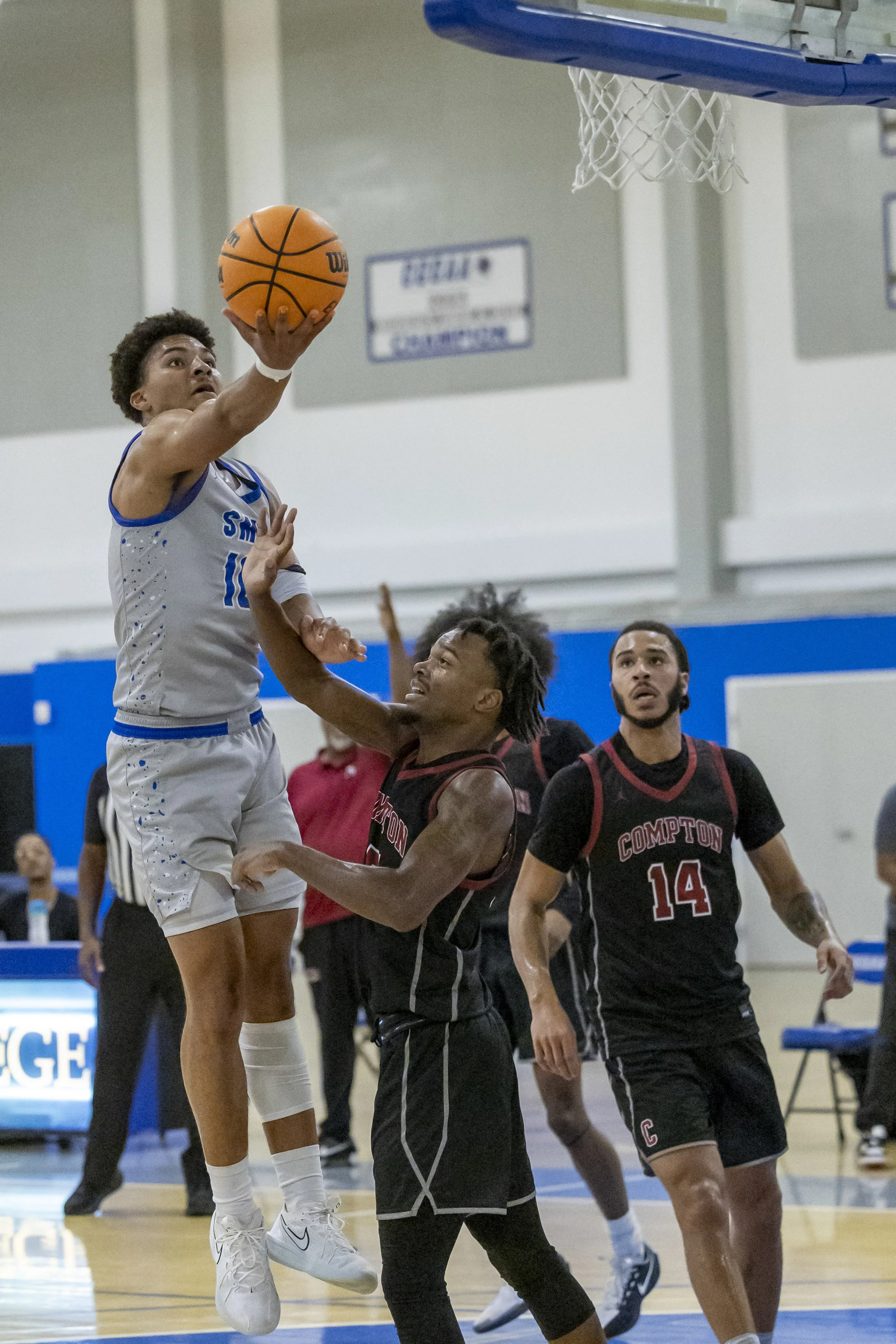  Santa Monica College (SMC) Corsair basketball player Khafre Garrett-Mills (#10) is attempting a shot during the SMC men’s basketball match against Compton College at Corsair Gym, Santa Monica, Calif., Nov. 7, 2025. The Corsair won 82-67. (Masie Naja