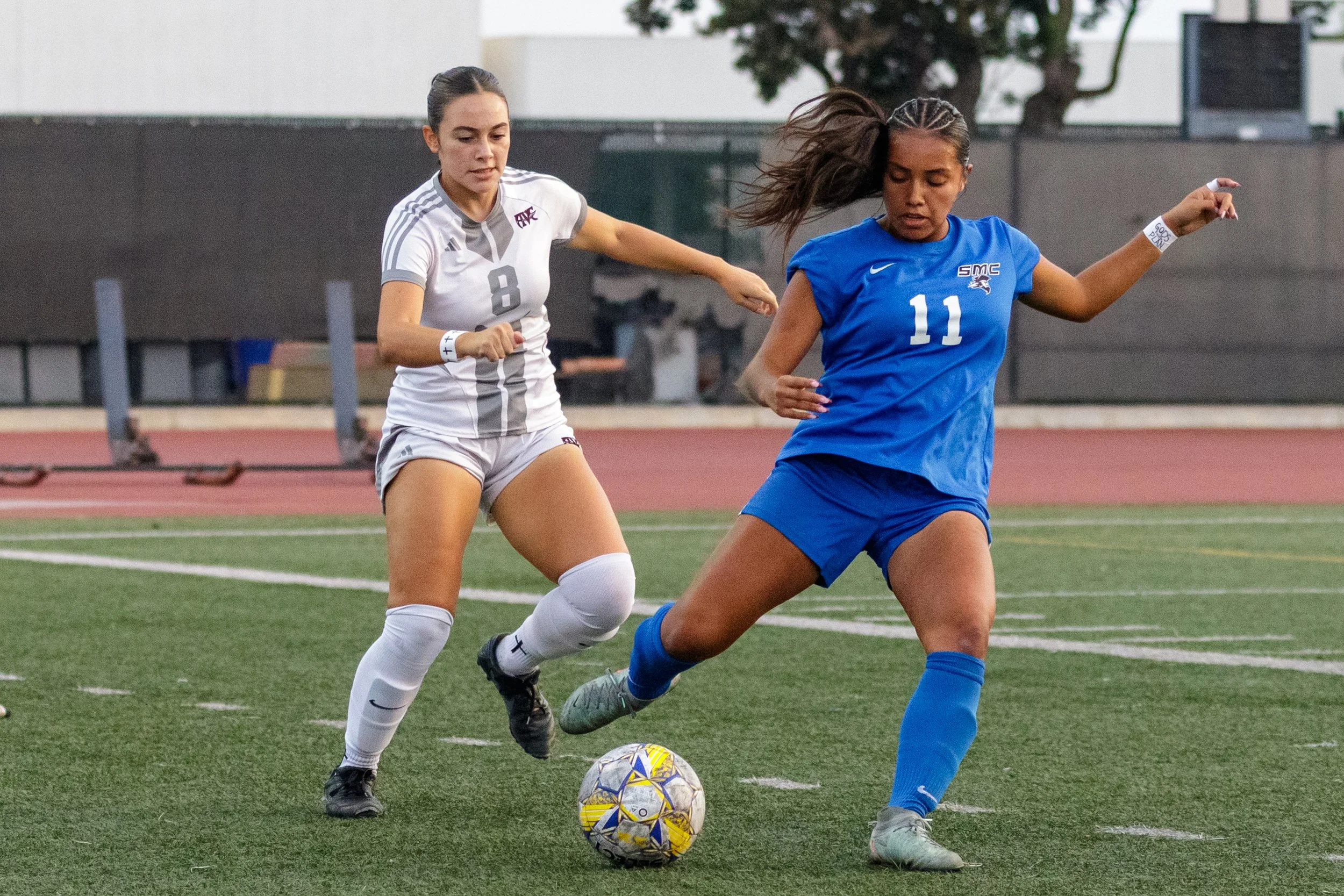  Saydee Martinez (Left), midfielder for the Antelope Valley College (AVC) Marauders, tackles Erika Bautista (Right), forward for the Santa Monica College (SMC) Corsairs on Thursday Nov. 14, 2025 at Corsair Stadium, Santa Monica College in Santa Monic