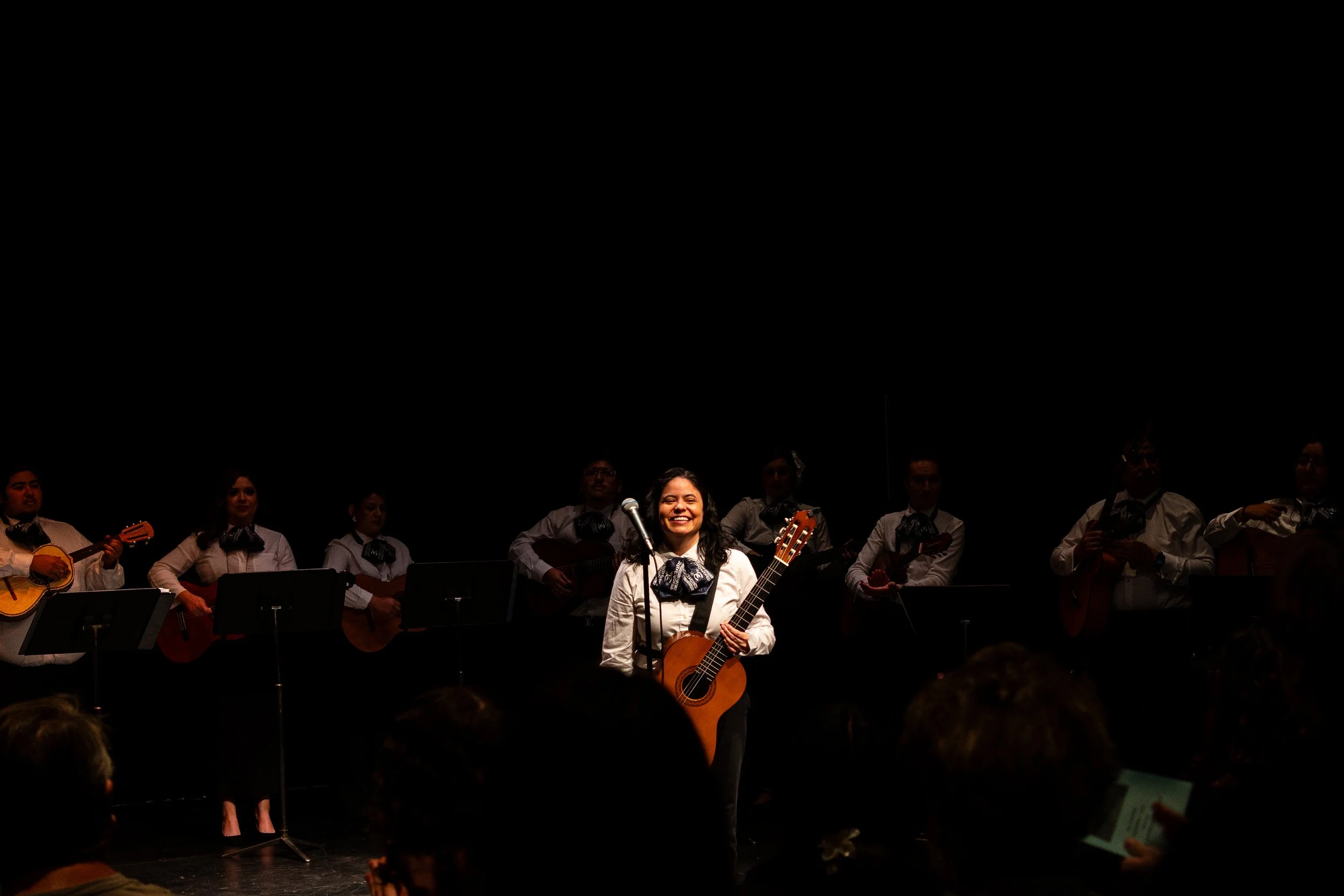  Mary Alfaro, the instructor for the Mariachi Ensemble class at Santa Monica College (SMC), introduces herself, along with her class, to an audience gathered to watch a free concert performed at The Eyde Second Space at the SMC Performing Arts Center