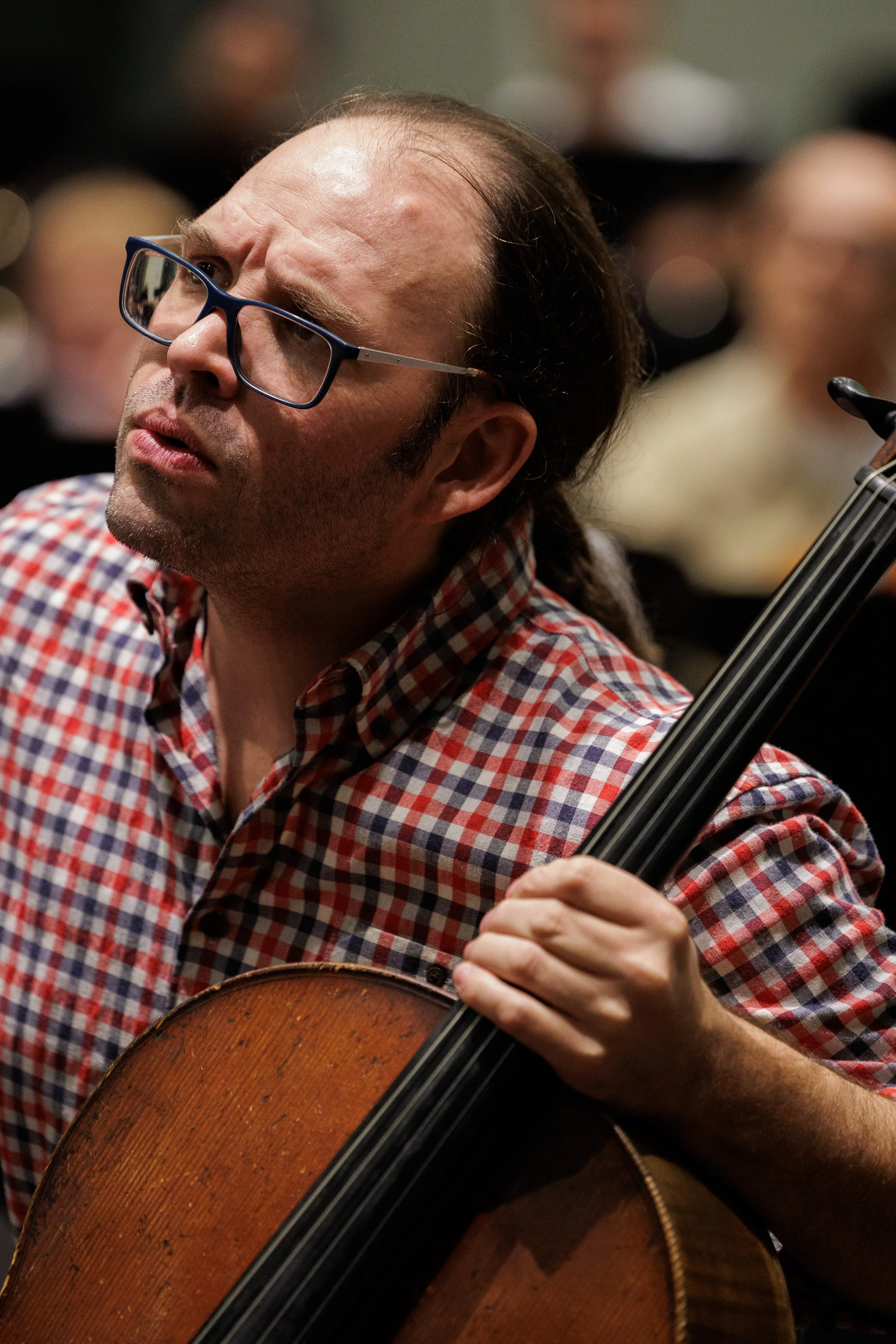  Santa Monica College (SMC) Symphony Orchestra principal cellist Mark Bassett during the first Children’s Concert rehearsal with SMC dancers on Tuesday, Oct. 21, 2025, at SMC Performing Arts Center Room 110 at BroadStage in Santa Monica, Calif. Basse