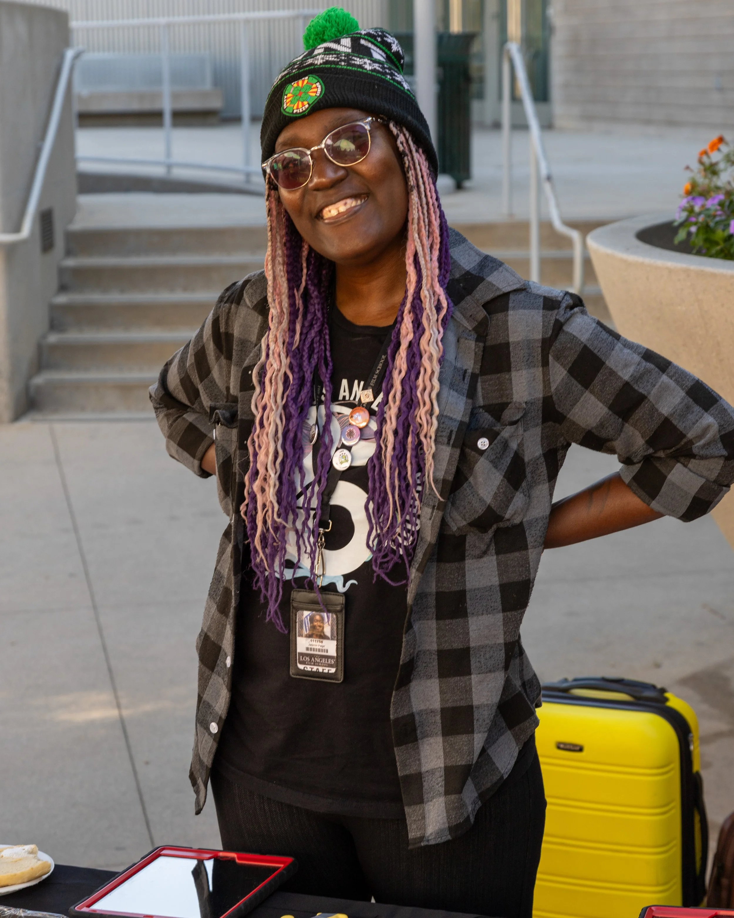  Jasmin Page (cq) poses for the camera at her employer, the Los Angeles Film School's booth on the campus of Santa Monica College (SMC), Thursday, October 9, 2025 in Santa Monica, Calif. Many smaller local colleges advertised themselves to prospectiv