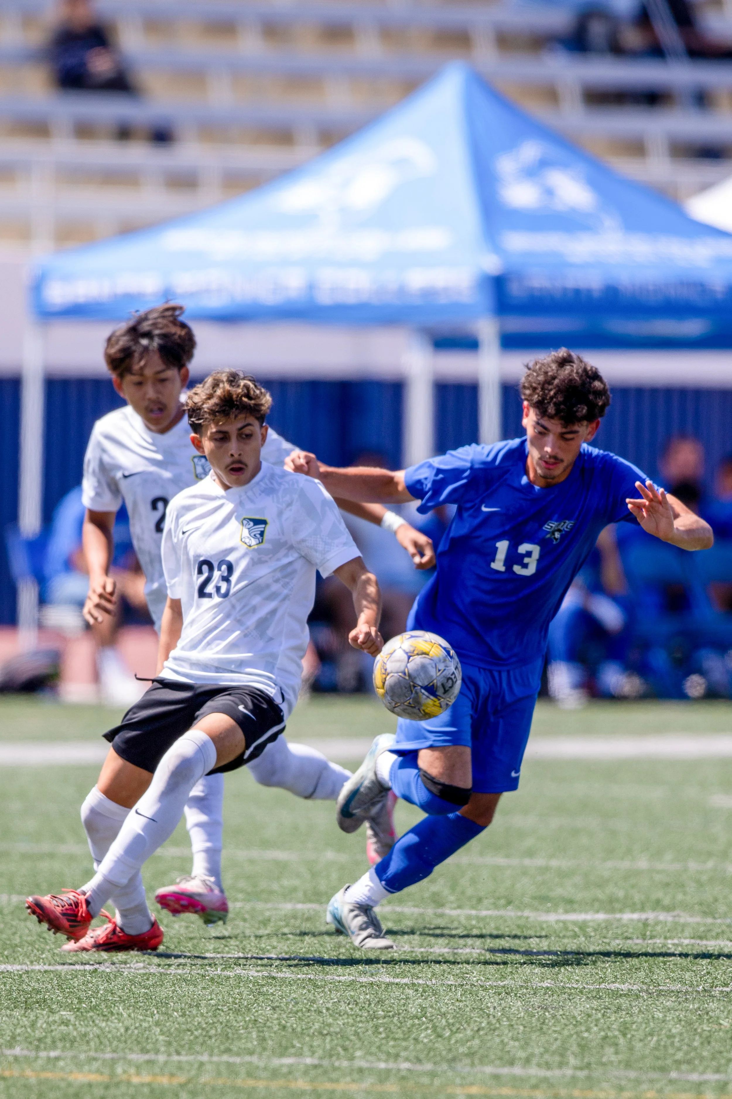  Santa Monica College (SMC) Corsairs forward Miguel Cano (#13) attempting to gain control of the soccer ball against Fullerton College Hornets middle Diego Bravo (#23) at SMC Corsair Stadium, Santa Monica, Calif. SMC Corsairs tied with Fullerton Coll