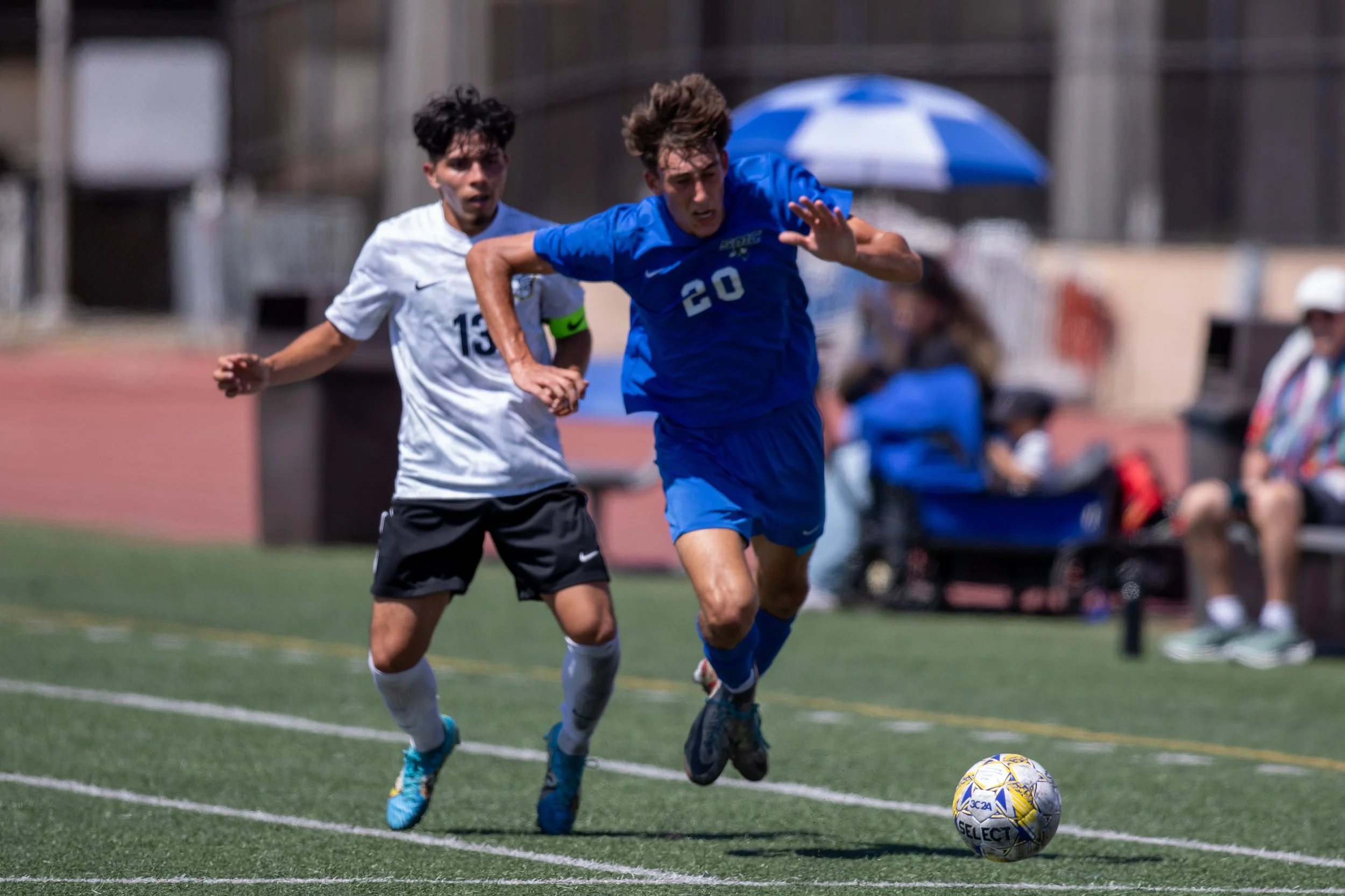  Fullerton College Hornets middle Cisco Torres (#13) tripping Santa Monica College (SMC) Corsairs middle Leo Blanchet (#20) during a match at SMC Corsair Stadium, Santa Monica, Calif. SMC Corsairs tied with Fullerton College Hornets 4 to 4, continuin