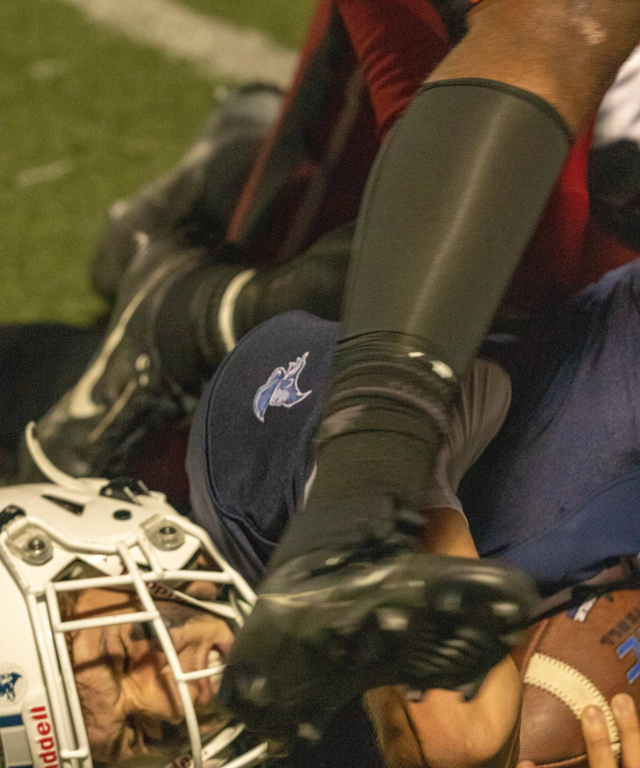  Santa Monica College (SMC) Corsairs quarterback (#13) Dylan Moreno was tackled by a L.A. Pierce College Brahmas player during SMC’s homecoming game at SMC Corsair Stadium, Santa Monica, Calif. on Thursday, Oct 9, 2025.  The SMC Corsair won L. A. Pie