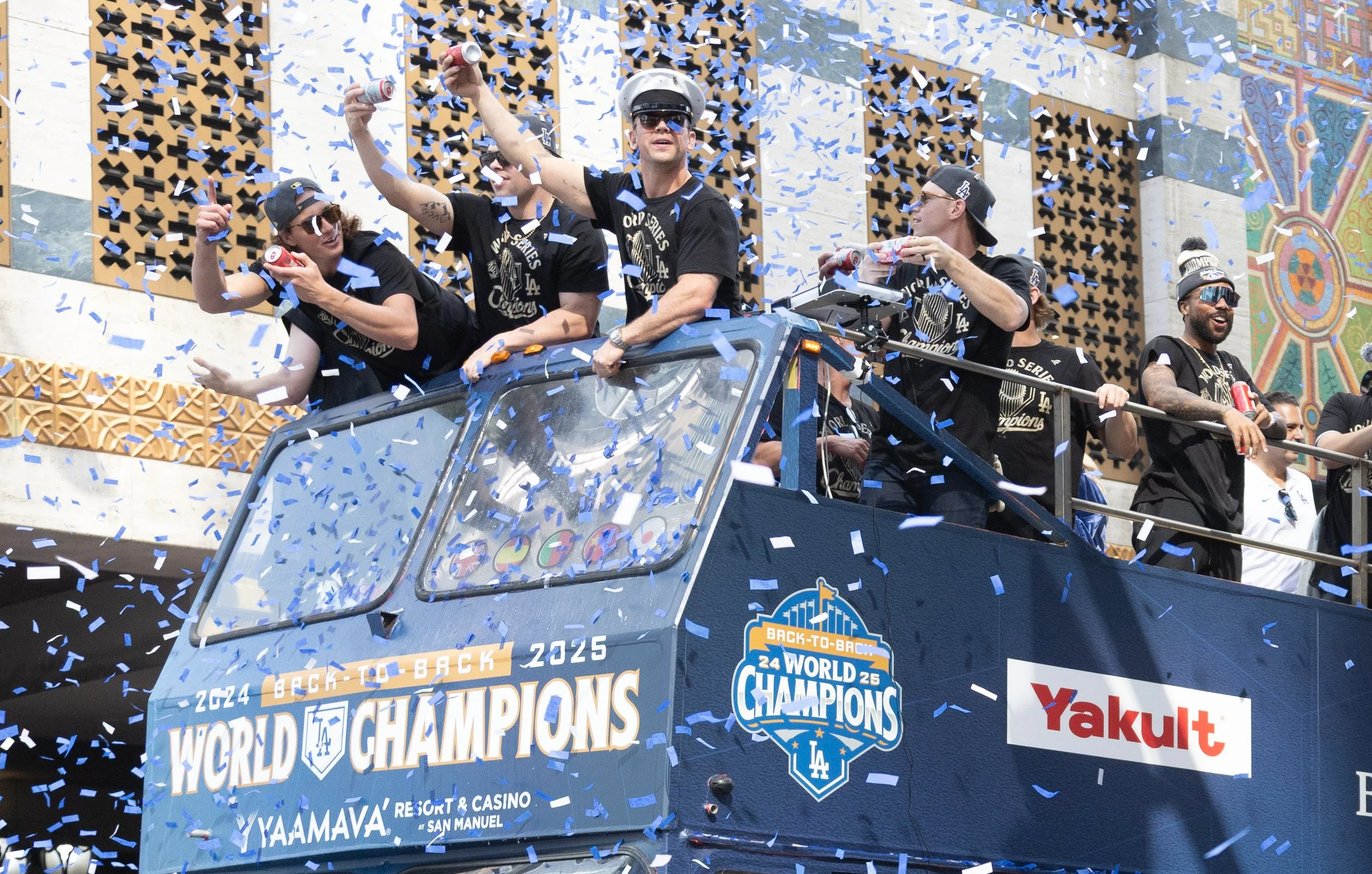  Players, staff, and family of the Los Angeles Dodgers celebrate on top of a double-decker sightseeing bus at the Los Angeles Dodgers' victory parade, Monday, November 3, in Los Angeles, Calif. The Dodgers secured their 9th World series championship 