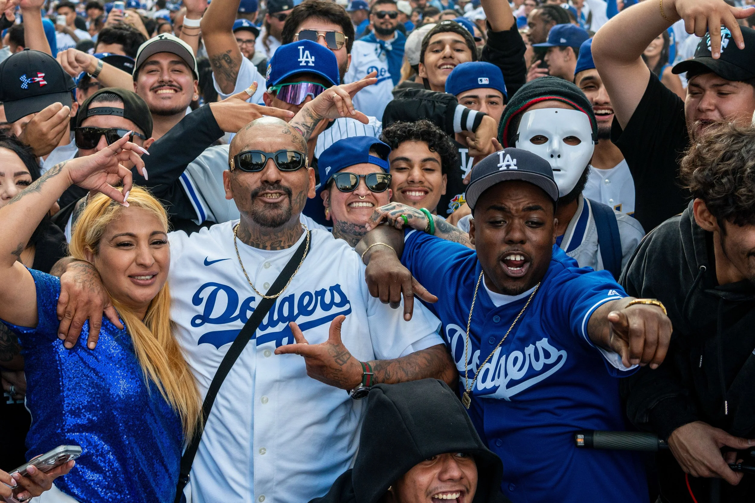  A large crowd gathers on S. Figueroa St. in downtown Los Angeles shortly after the parade for the Los Angeles Dodgers concluded, Monday, Nov. 3, 2025, in Los Angeles, Calif. The parade was organized by the Dodgers after their victory over the Toront
