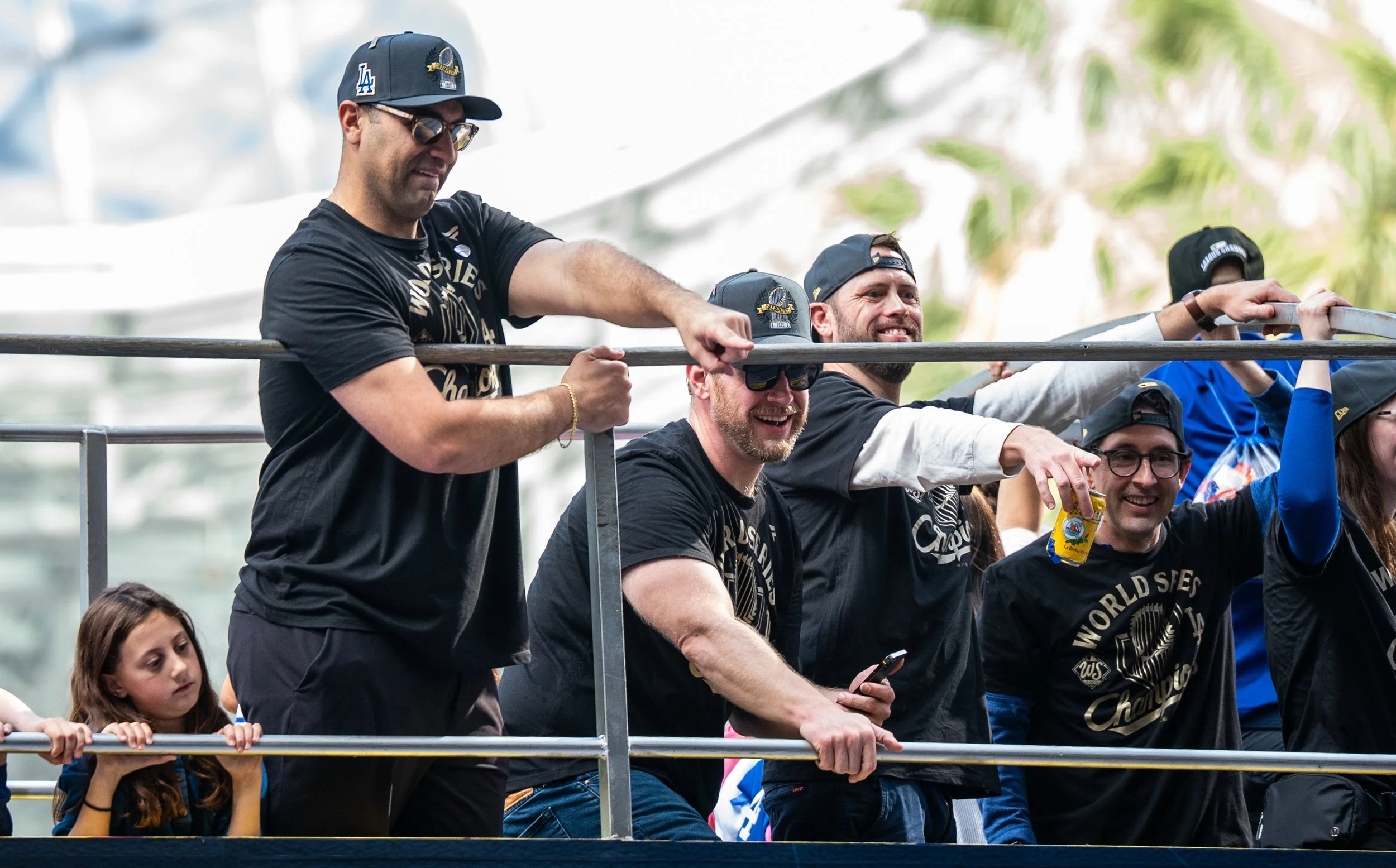  Los Angeles Dodger players waiving to fans along the parade route on Monday, November 3, 2025, Los Angeles, Calif. The Dodgers won the 2025 World Series. (Tom Rosholt | The Corsair) 