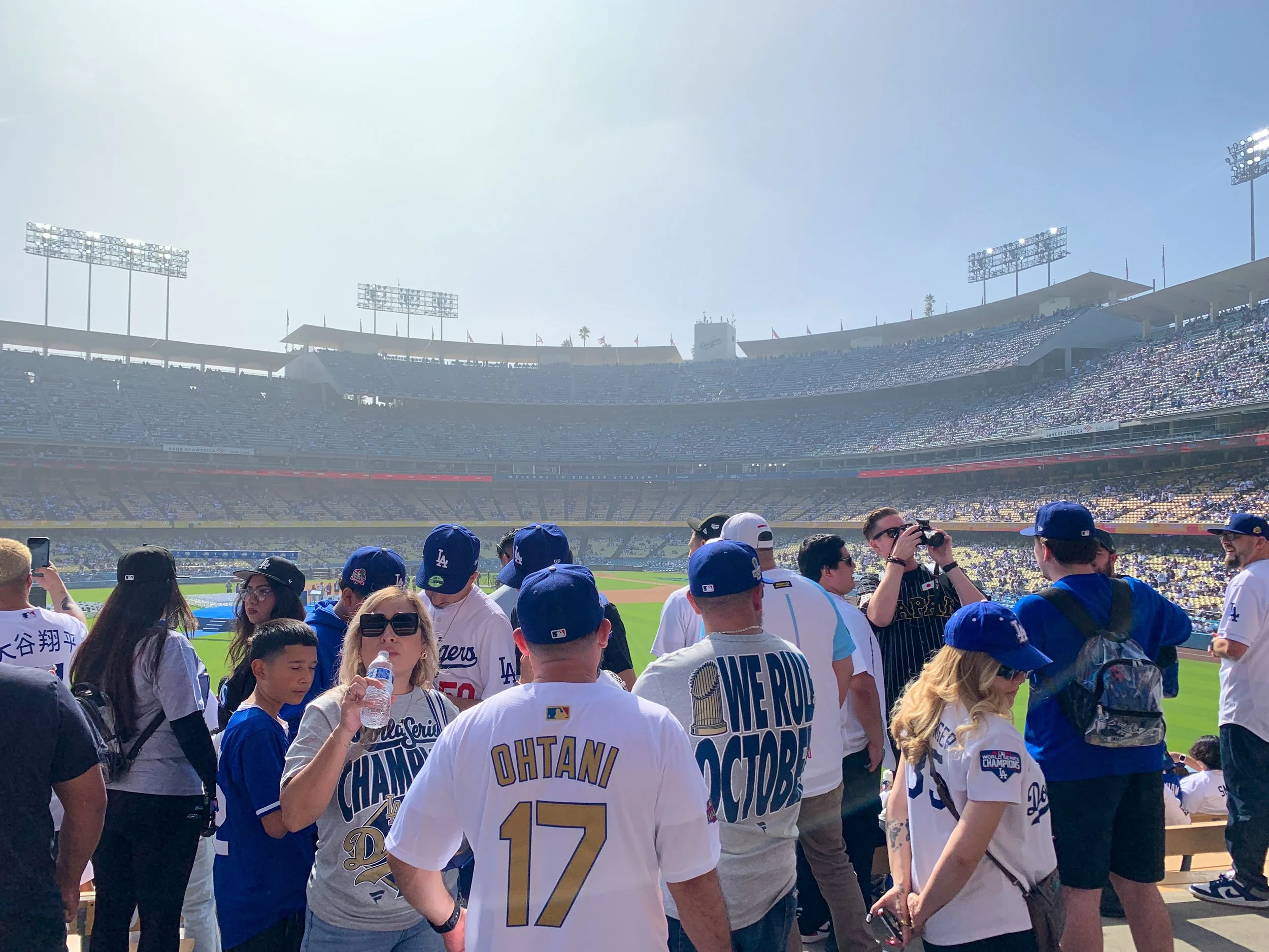  Dodger fans taking photos and waiting for the celebration event to start in Los Angeles, Calif., on Monday, Nov 3 2025, (Rafael Lopez | The Corsair) 