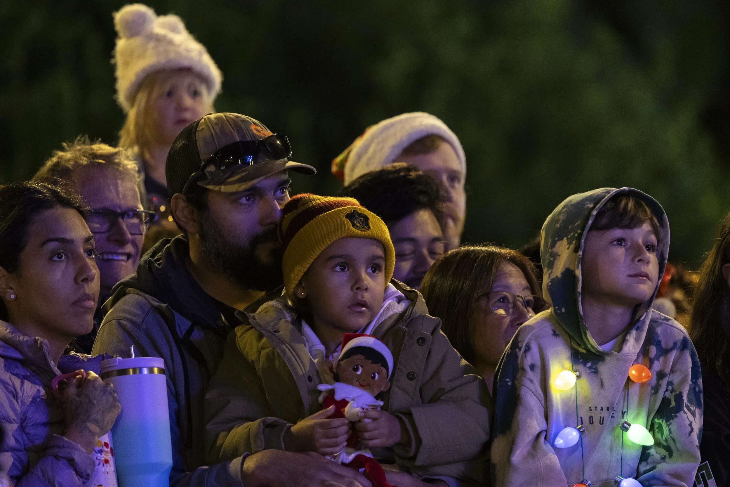  Thousands gather in Altadena, Calif., on Saturday, Dec. 8, 2025, for the 105 Christmas Tree Lane lighting ceremony. A stretch of deodar cedar trees on Santa Rosa Boulevard is decorated with Christmas tree lights by volunteers and simultaneously turn