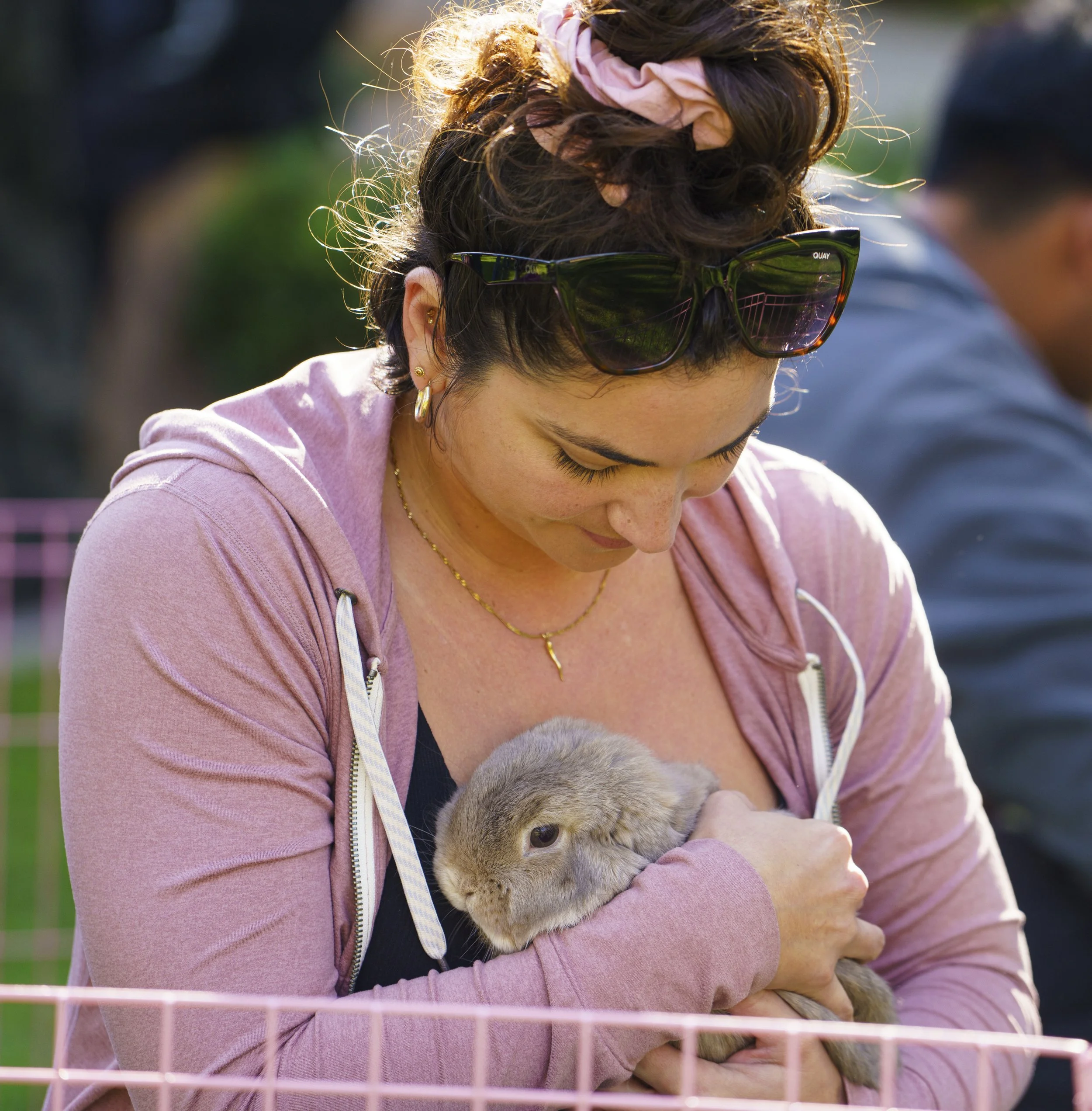 Cheyenne Soufl (cq) SMC nursing student pets bunny at Santa Monica College Associated Students event Bunny Break were 5 students can enter bunny pit for 3 minute intervals to pet bunnies at Santa Monica College in Santa Monica, Calif., Tuesday Dec. 