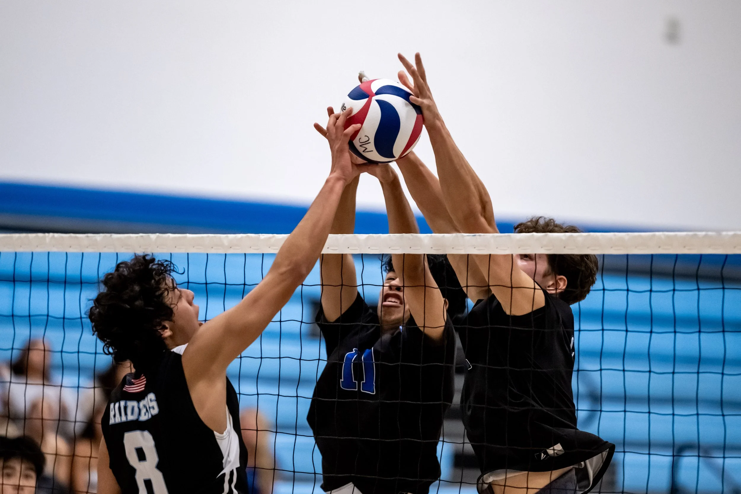  Santa Monica College Corsairs (L to R) Steven Ashby (11) and Demian Anisimov (7) block the shot of Moorpark City College Raiders Marco Farabolini (8) in Moorpark, Calif., on Friday, Feb. 27, 2026. The Corsairs won the match 3 sets to 1. (Tom Rosholt