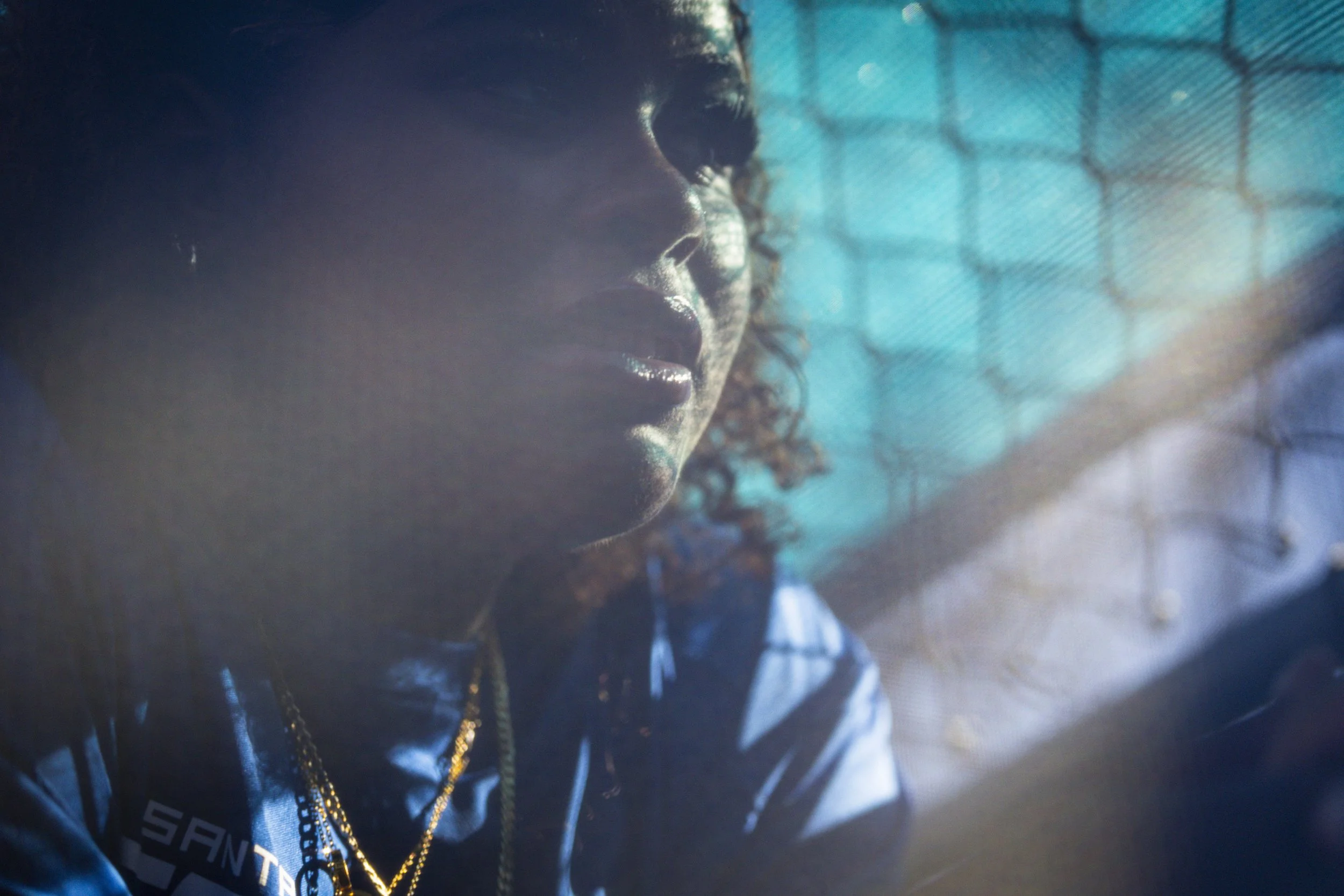  Santa Monica College (SMC) Corsair Jaydah Mena (cq), who is still waiting to be eligible for the team, in the dugout during her future teammates’ game against Los Angeles Valley College Monarchs on Thursday, Feb. 26, 2026, in the John Adams Middle S