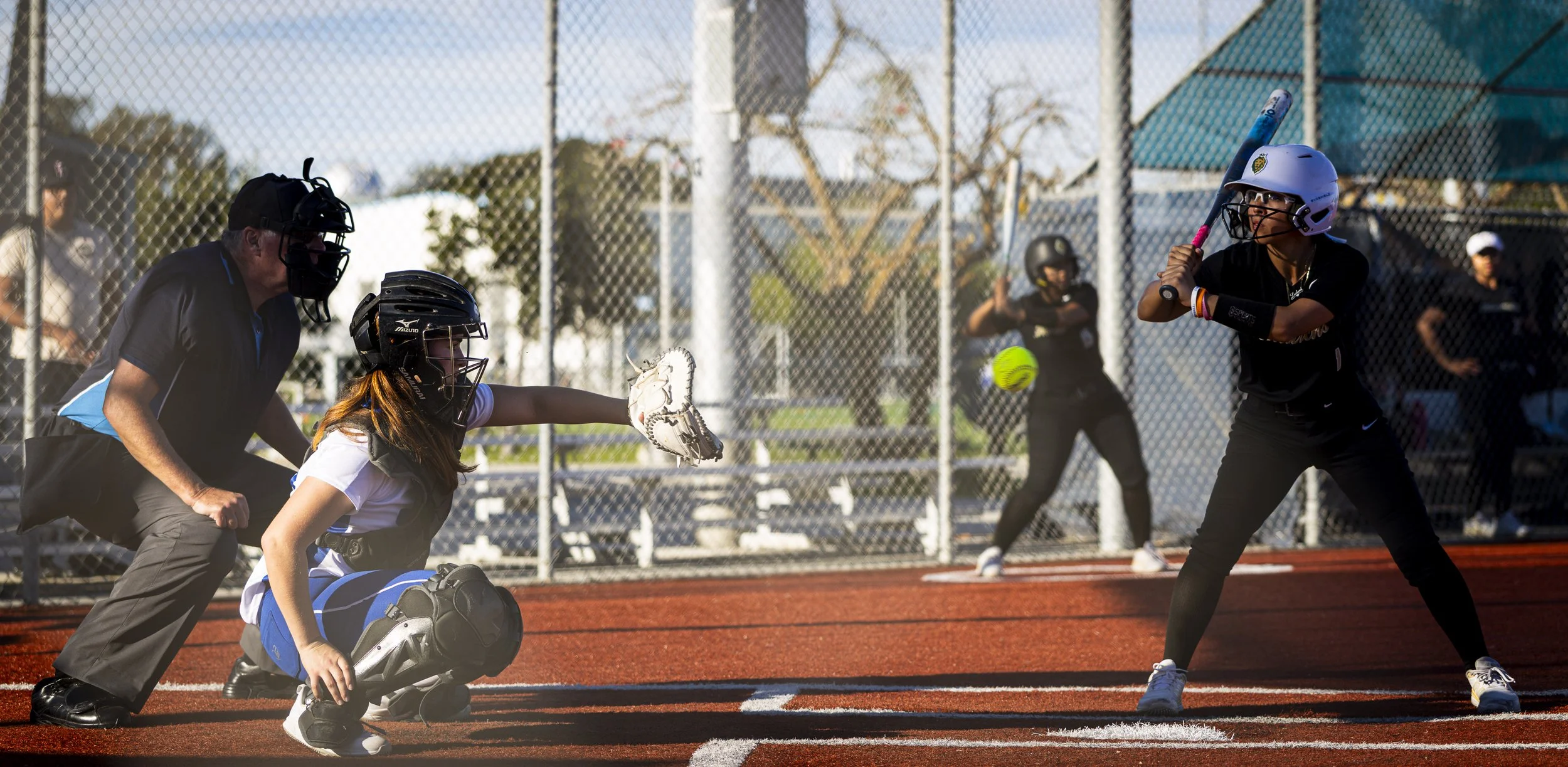  (R to L) Los Angeles Valley College Monarch (1) Leilani Gurrola (cq) misses a pitch as Santa Monica College (SMC) Corsair (15) Meridian Cordova (cq) gets ready to catch the ball during their game on Thursday, Feb. 26, 2026, in the John Adams Middle 