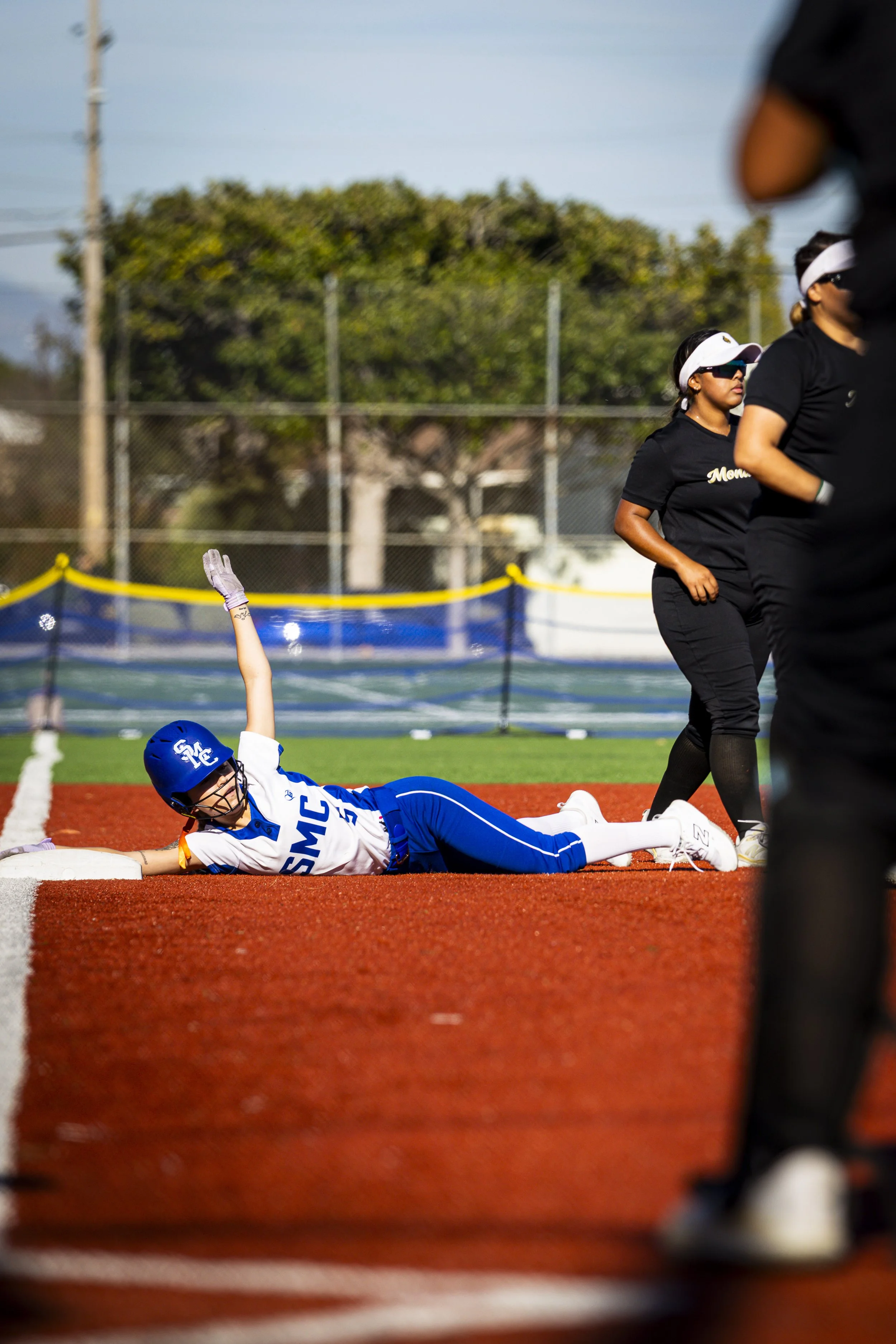  Santa Monica College (SMC) Corsair (5) Alexa Escobar (cq) after diving into third base during their game against Los Angeles Valley College Monarchs on Thursday, Feb. 26, 2026, in the John Adams Middle School softball pitch in Santa Monica, Calif. C