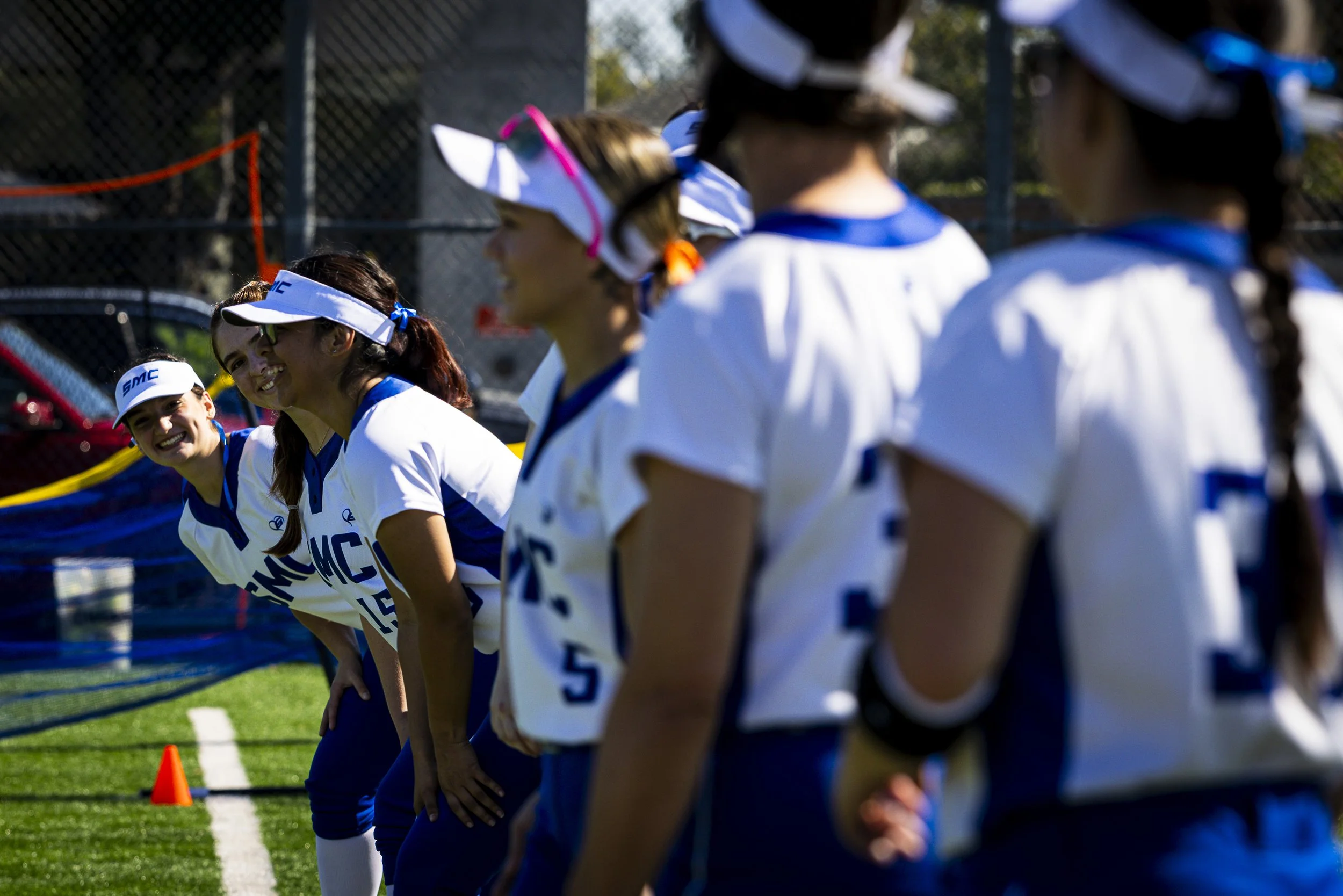  Santa Monica College (SMC) Corsairs women’s softball team gets ready to do some warm-up drills before their game against Los Angeles Valley College Monarchs on Thursday, Feb. 26, 2026, in the John Adams Middle School softball pitch in Santa Monica, 
