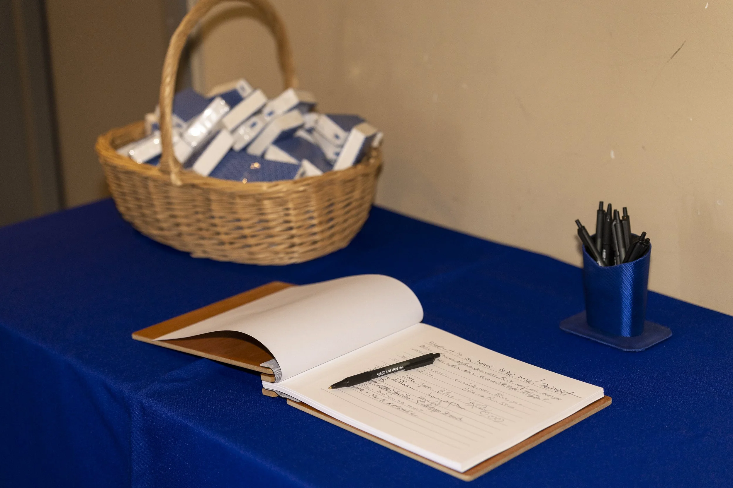  Guest book with messages and signatures at the Memorial Service in honor of Blue Fier on Saturday, Feb. 28, 2026, at SMC Main campus in the Professor Harvey Stromberg Lecture Hall HSS 165 in Santa Monica, Calif. Blue Fier was a photography professor