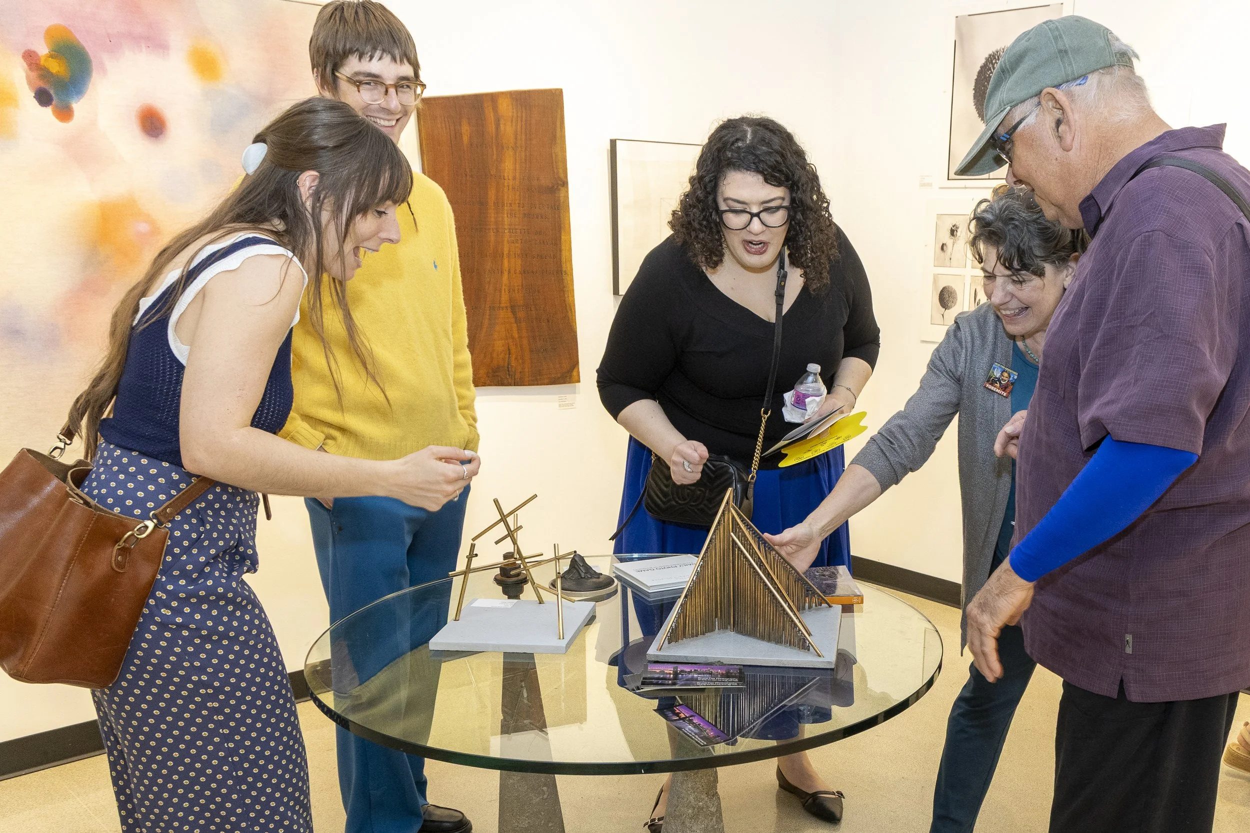  (L-R) Cassidy and Julian Rawlinson, friends of Blue Fier’s wife Kim Saunders, Amanda Dekermenji (CQ), friend of Blue Fier’s oldest son, Zack, and Thea and Johnny Fier, brother of Blue Fier, are touching and experiencing The Sound Walk sculpture duri