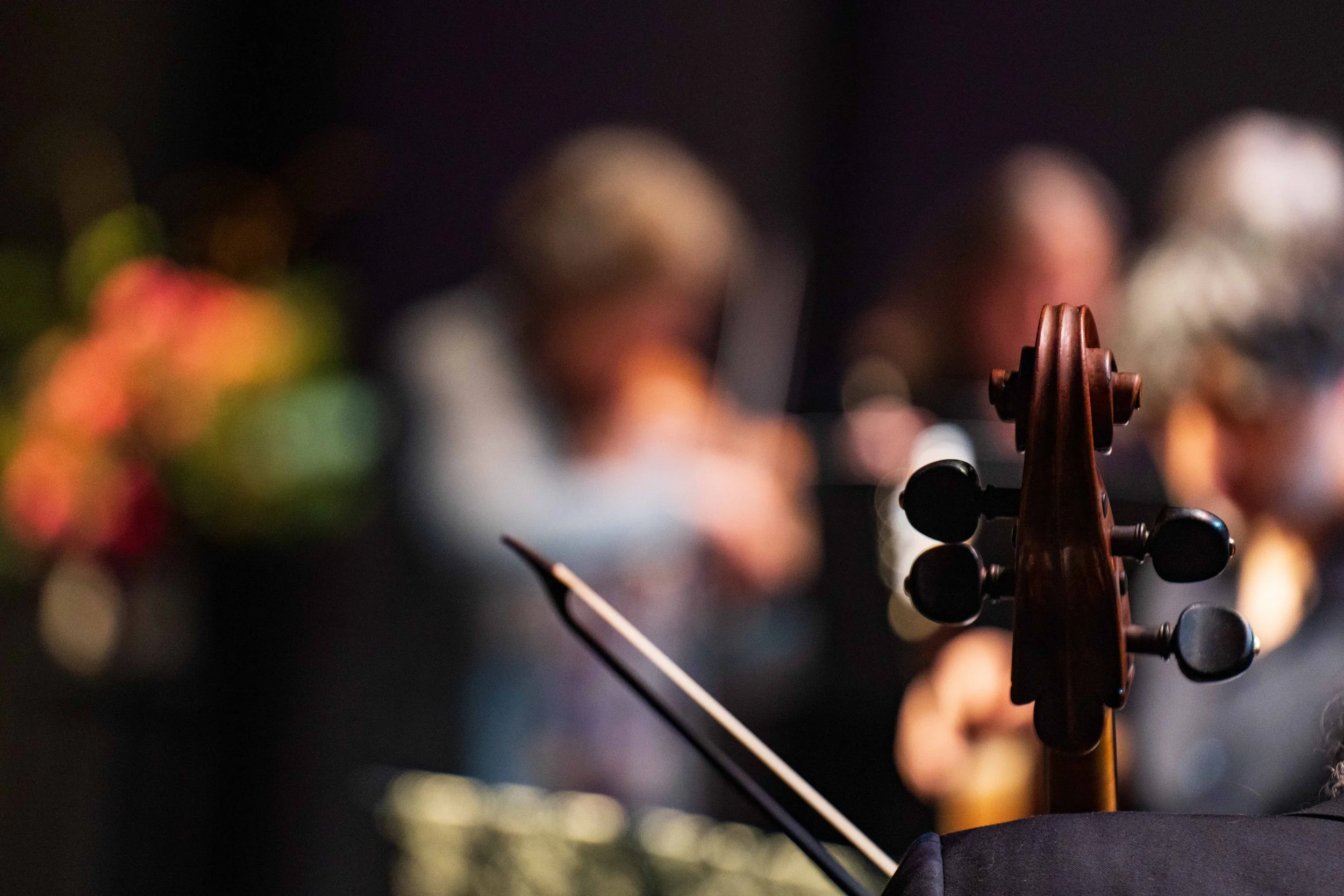  Cello scroll and baroque bow tip of Philharmonia Baroque Orchestra cello continuo William Skeen during dress rehearsal led by mandolinist Avi Avital on Sunday, Feb. 22, 2026, at BroadStage in Santa Monica, Calif. (Elizabeth Bacher | The Corsair) 