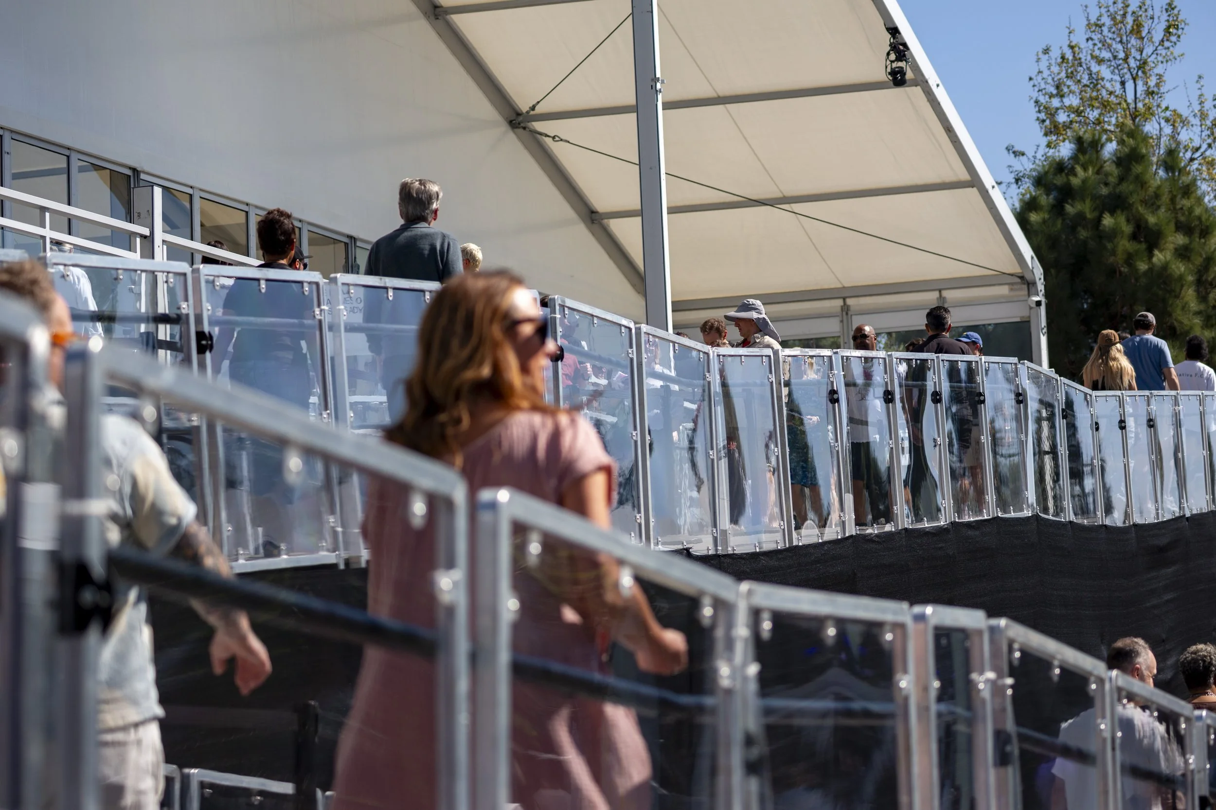 Visitors walk up a ramp as they enter Frieze Los Angeles at Santa Monica Airport on Feb. 28, 2026, in Los Angeles, Calif. (Jinhao Tian | The Corsair) 