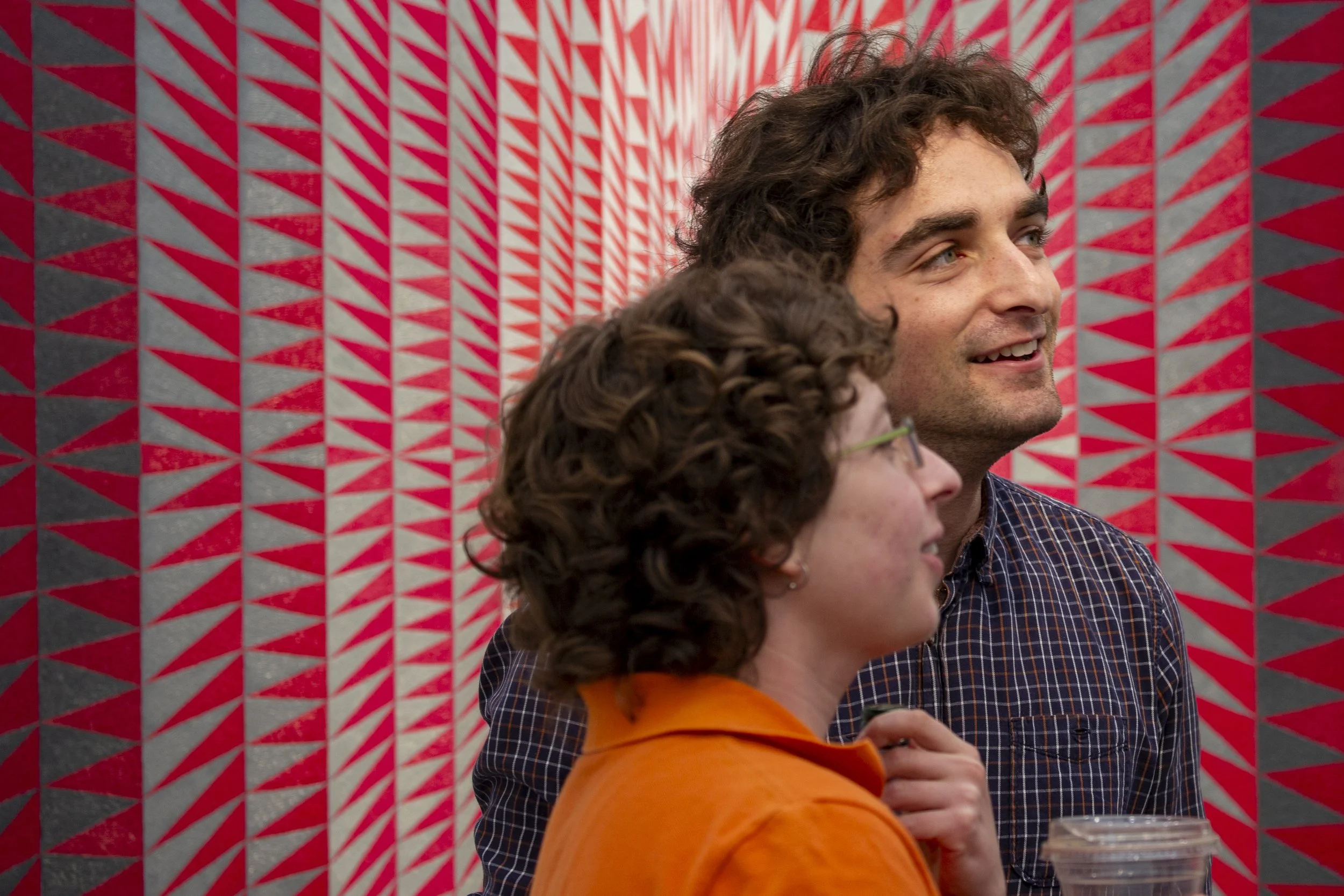  Visitors stand in front of an artwork and discussing during Frieze Los Angeles at Santa Monica Airport on Feb. 28, 2026, in Los Angeles, Calif. (Jinhao Tian | The Corsair) 
