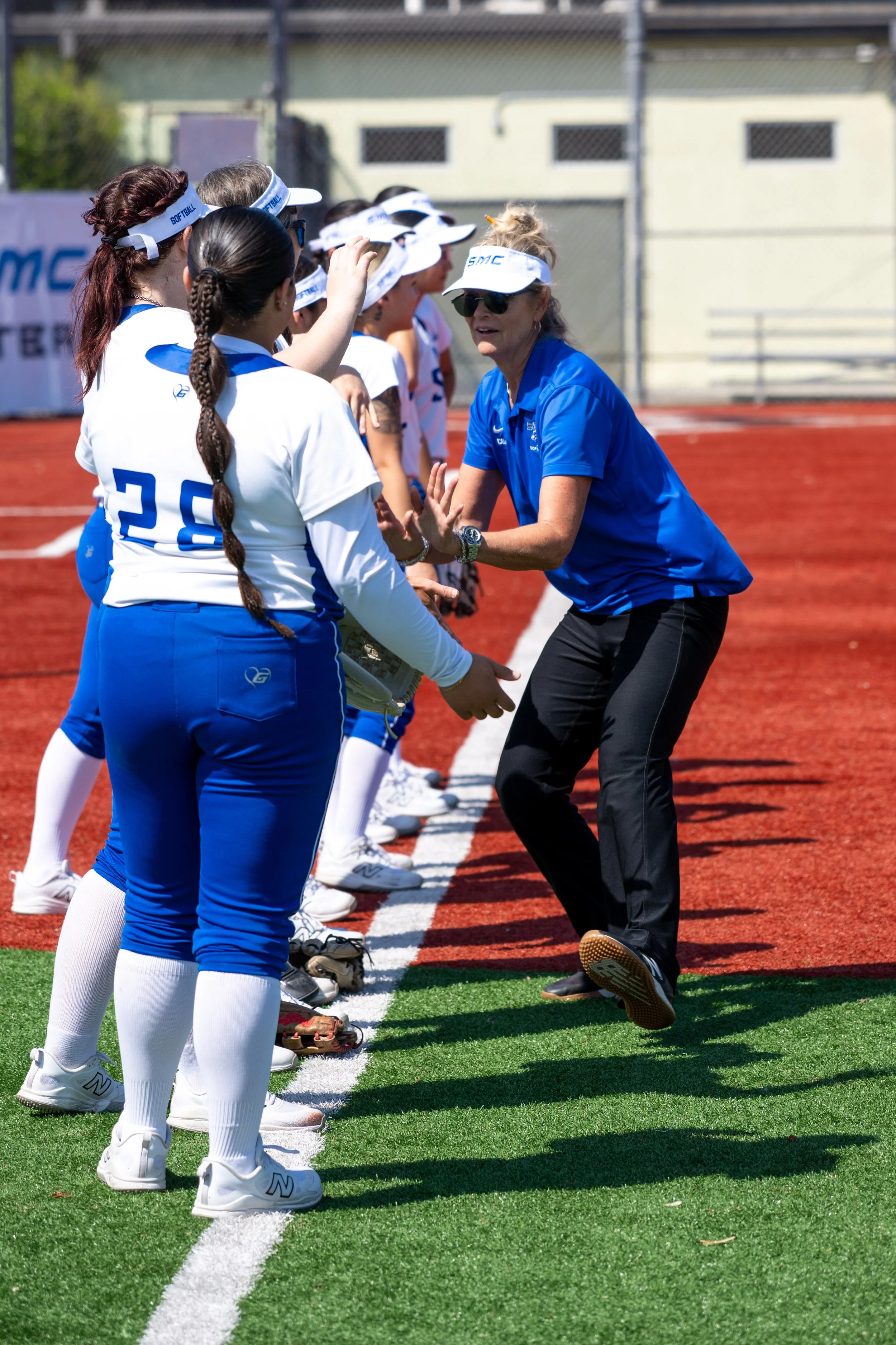  Santa Monica College Corsair Head Coach Christine Druckman motivates her team during a pre-game pep rally before their matchup against the Moorpark College Raiders in Santa Monica, Calif., on Friday, Feb. 27, 2026. The Corsairs fell to the Raiders, 