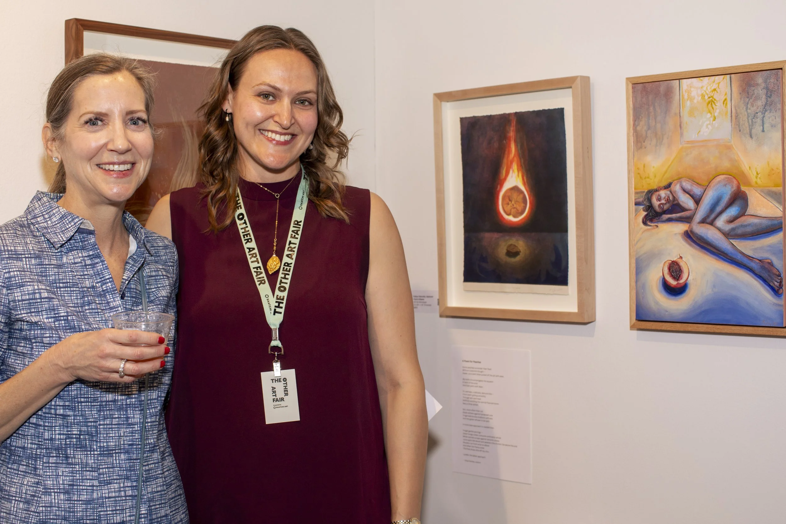  Holly Culbreth (L) celebrating her purchase of the two paintings on the wall with the artist Katya Jackson (R) at the opening night of The Other Art Fair in Culver City, Calif. Thursday, Febuary 27, 2026 (Andrew Starnes | The Corsair) 
