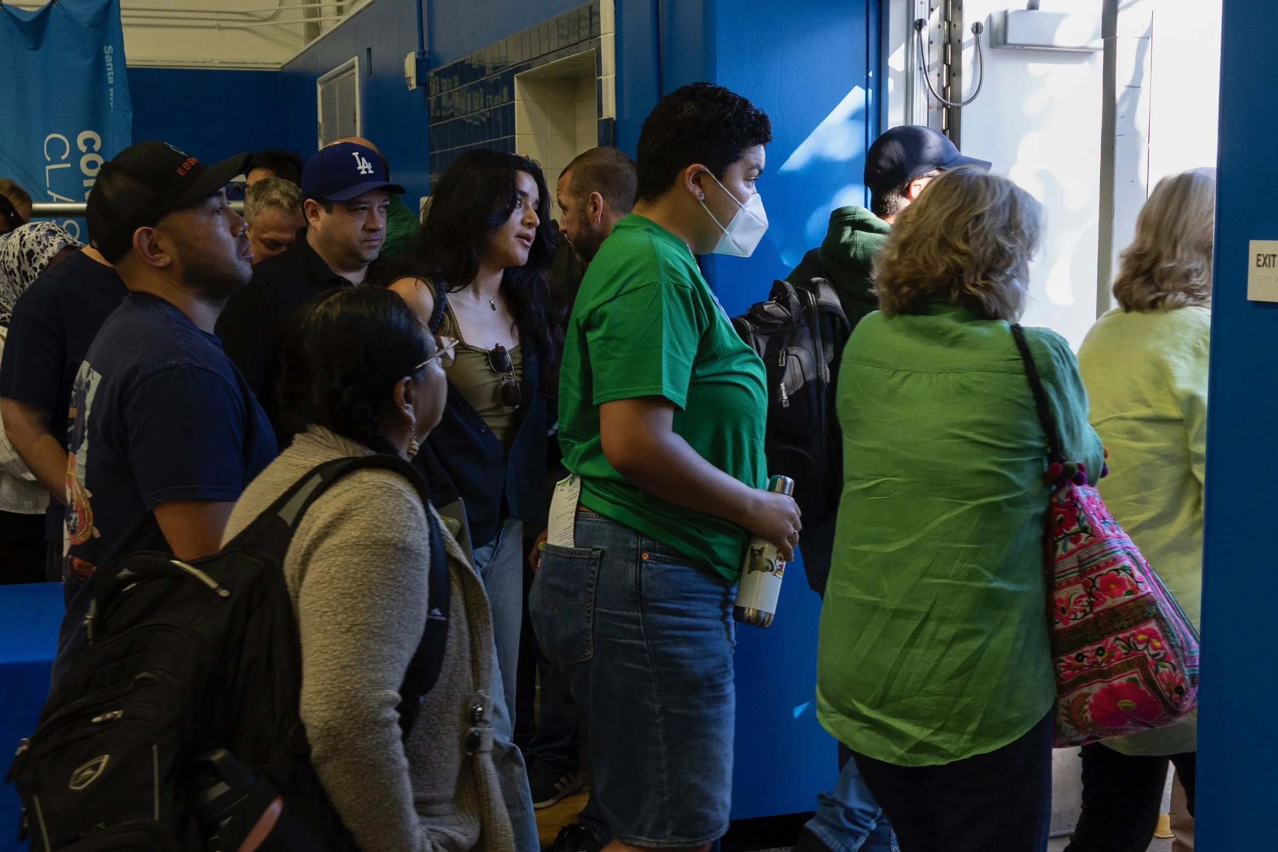  Santa Monica College faculty stage a walkout inside the Corsair Gym in protest of the Board of Trustees’s decision to eliminate more than 70 jobs to address its budget crisis. As President and Superintendent Kathryn Jeffery stepped towards the podiu