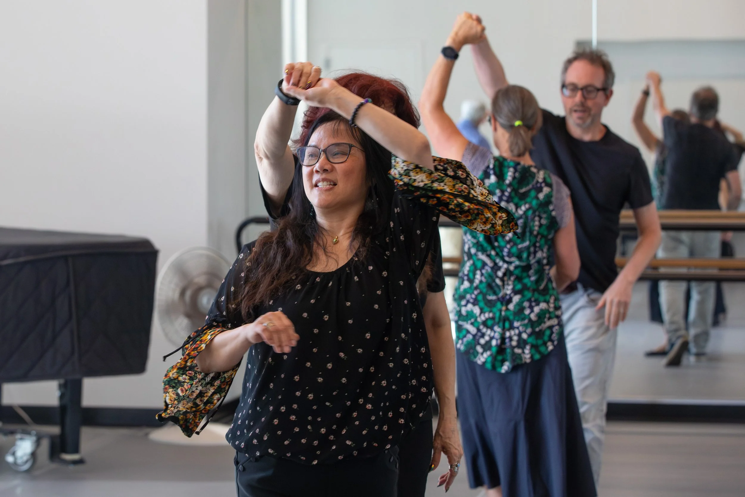  Santa Monica College staff members practice basic dance moves and salsa in pairs in a dance class in Room 310 at the Core Performance Center as part of the 2026 Spring Professional Development Day, Tuesday, March 17, 2026, in Santa Monica, Calif. (K