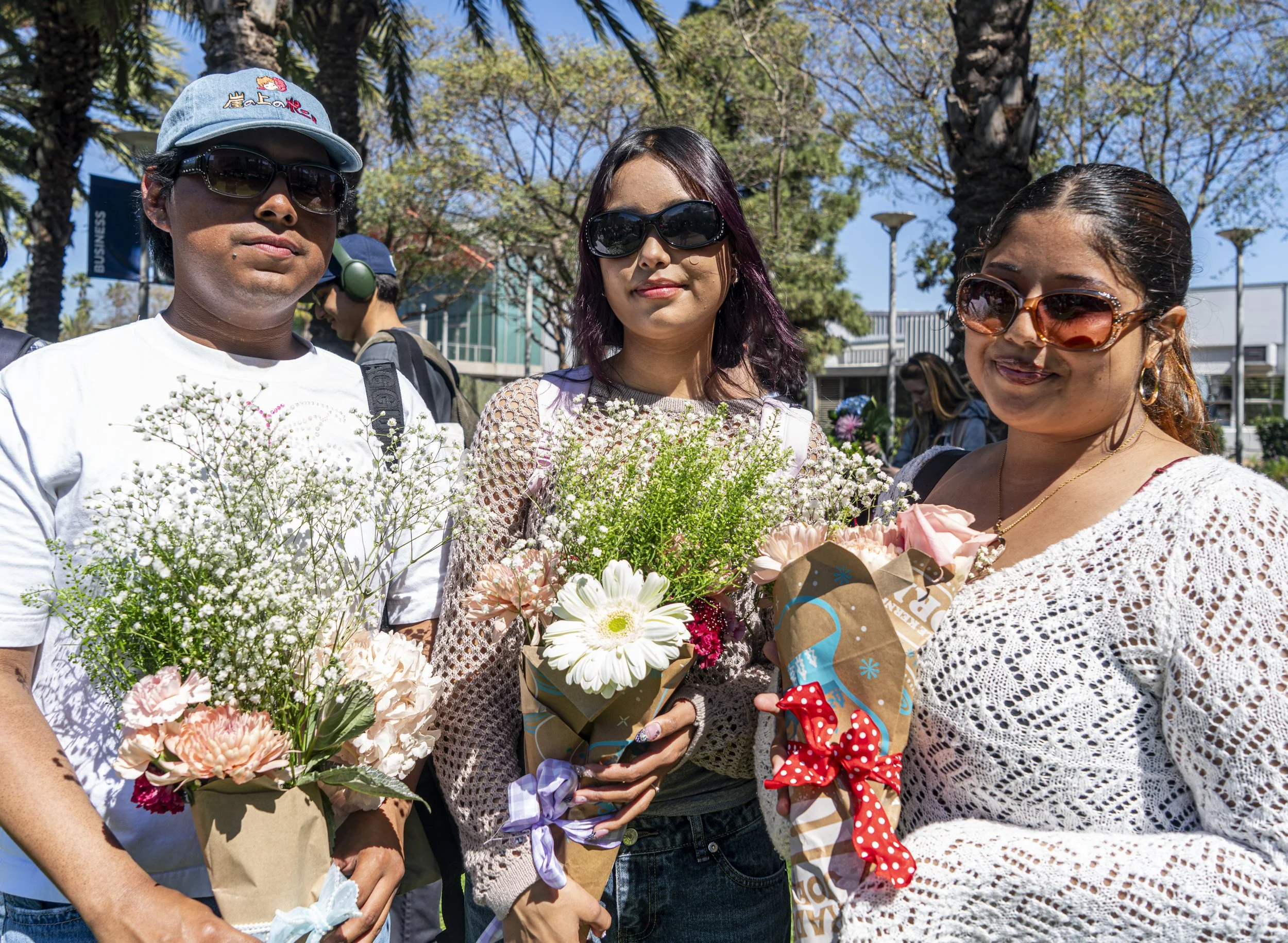  Santa Monica College students (L-R) Daniel Espinoza, Hailey Pedraza & Susana Cornejo at the Associated Students Flower Market at Santa Monica College in Santa Monica, Calif., Thursday March. 19, 2026 (Danny Sanchez | Corsair) 