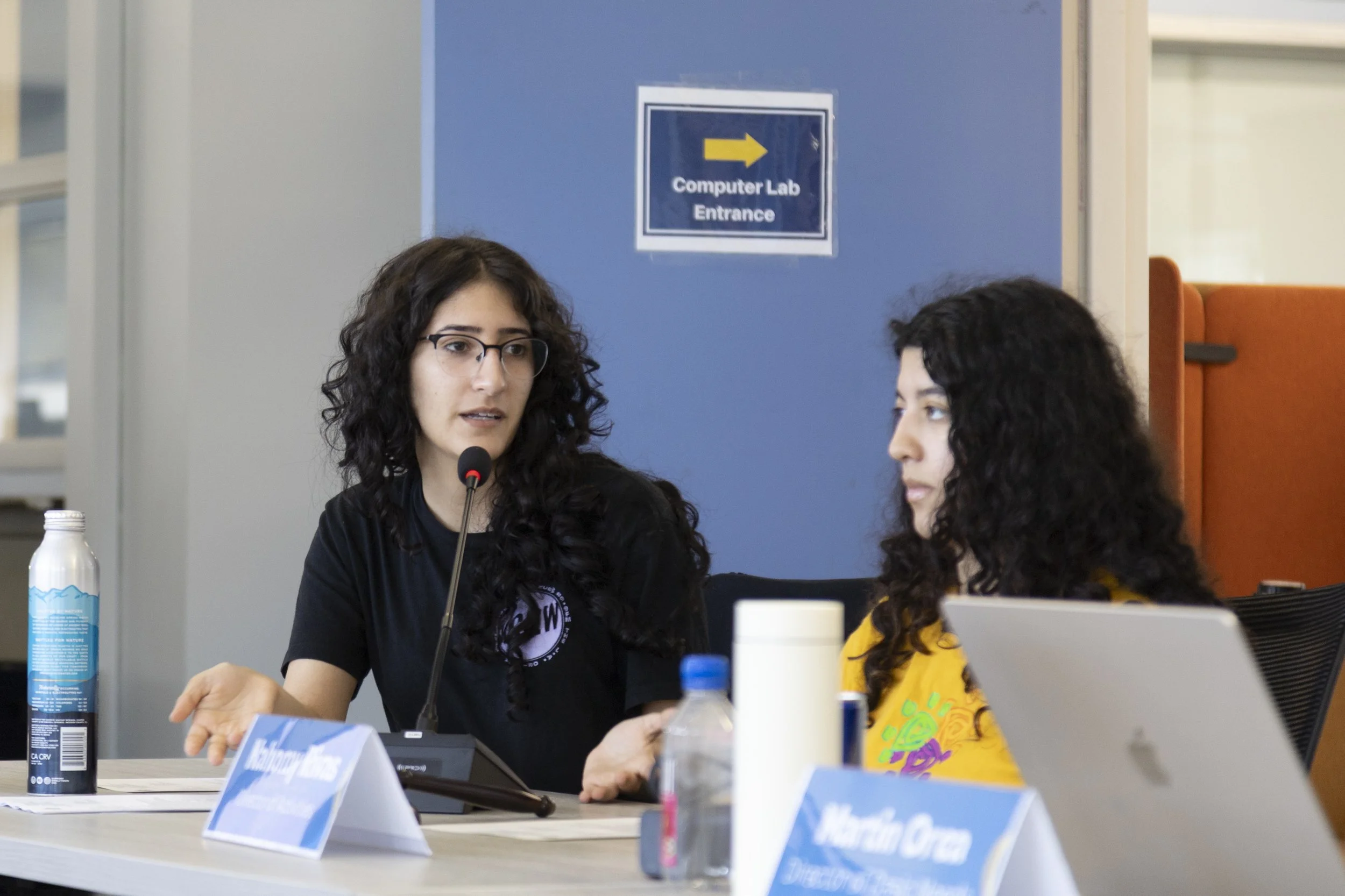  Santa Monica College (SMC) Associated Students (AS) Director of Sustainability Leila Kashani (cq) and Director of Activities Nahomy Rivas (cq) (left to right) discuss a proposal for funding at the Santa Monica College (SMC) Associated Students (AS) 