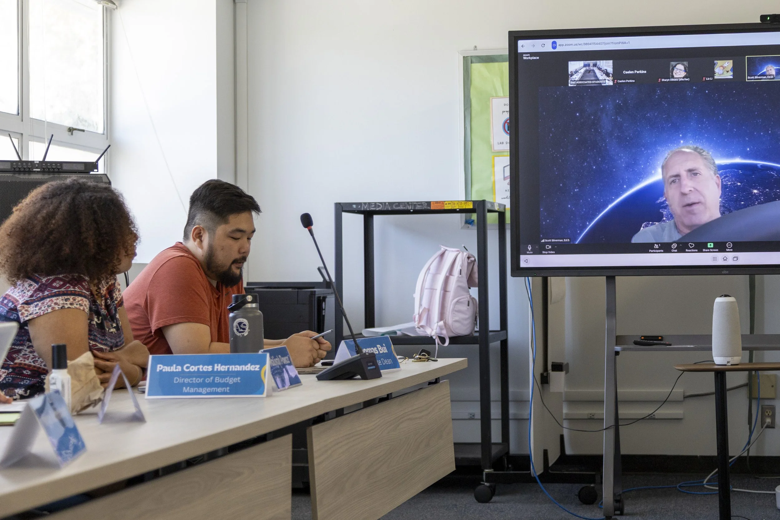  Santa Monica College (SMC) Associated Students (AS) Director of Equity and Diversity Maliyah Ponce (cq) (left) and Associate Dean Thomas Bui (cq) (center) talk to Associate Dean of Noncredit and External Programs Scott Silverman (right), who is atte