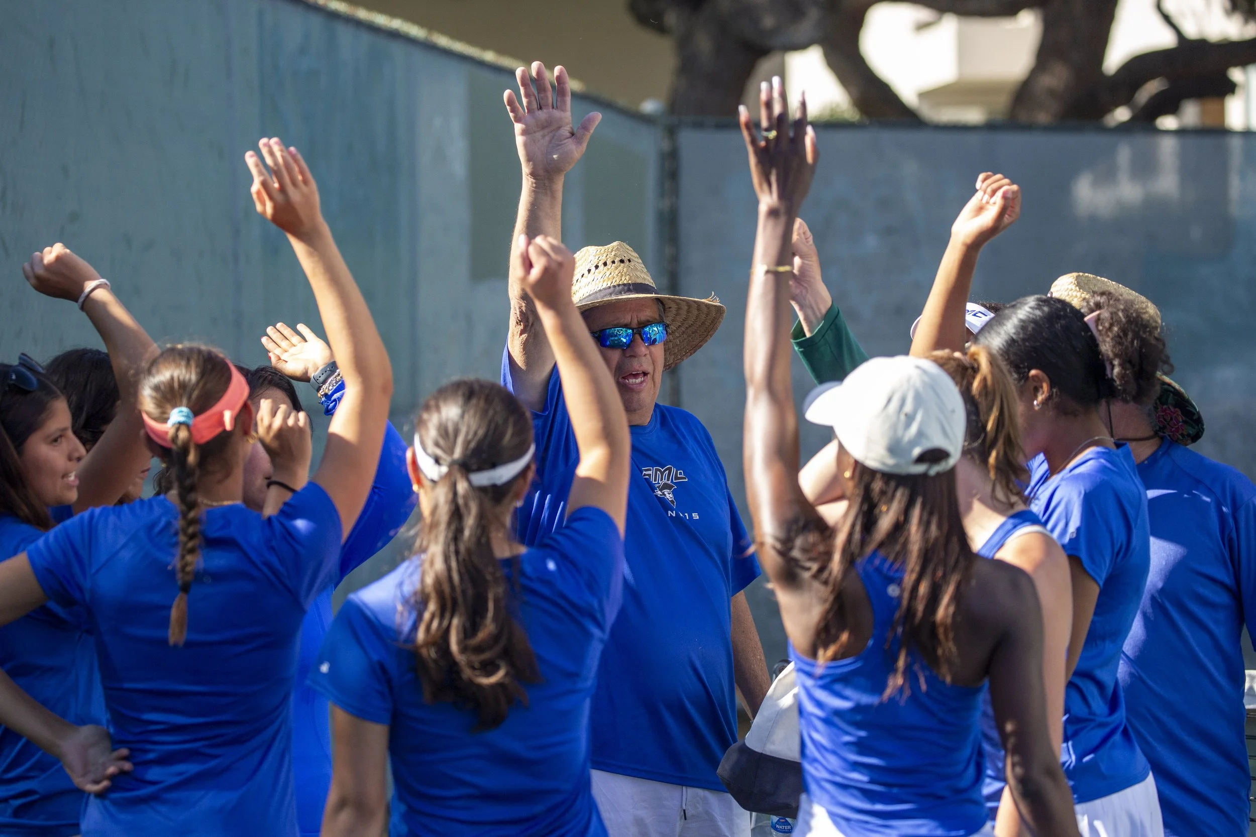  Ron Hightower, coach of Santa Monica College, rallies his team during a singles match against College of the Canyons at Ocean View Park Tennis Courts in Santa Monica, Calif., on Tuesday, March 17, 2026. College of the Canyons won the match on sets a