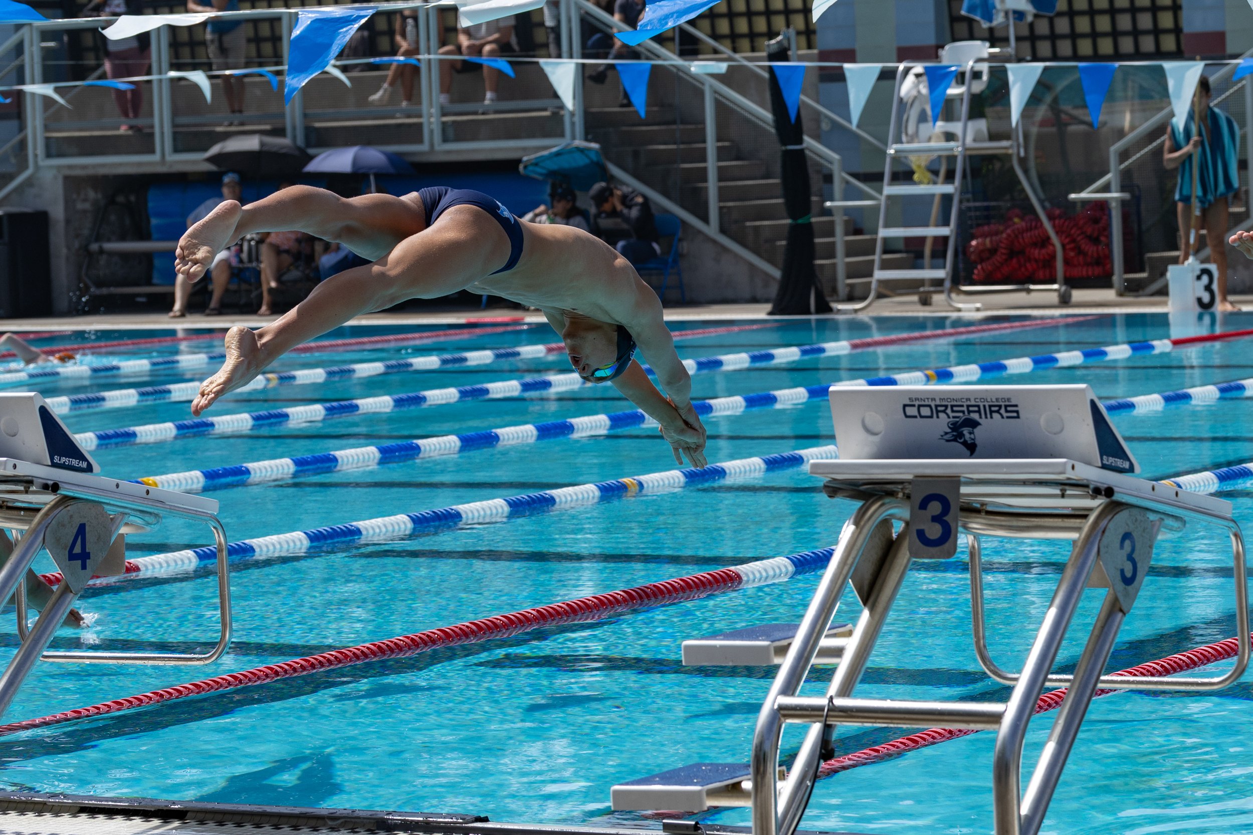 Ronan Suarez, Santa Monica College (SMC) Swimming & Diving Corsair, dives to compete in the 1650 yards long distance freestyle event during the Western State Conference (WSC) #3 Swimming and Diving Meet on Friday, March 27, 2026, at the SMC Pool in 