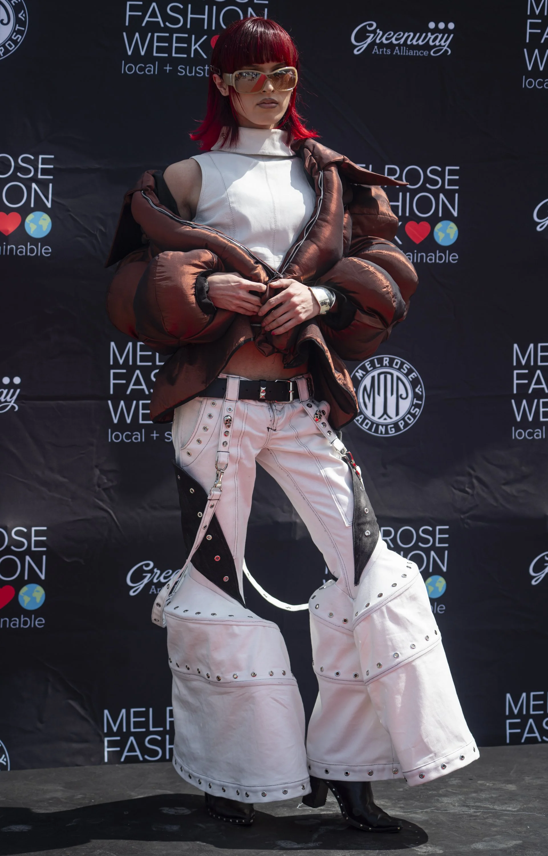  Eve fong Model and Fashion Designer of ASU FIDM on the runway in her own design at the second annual Melrose Fashion Week Runway Show this was Jimenez's time at Melrose Trading Post at Melrose at Fairfax High School in Los Angeles, Calif., Sunday Ma