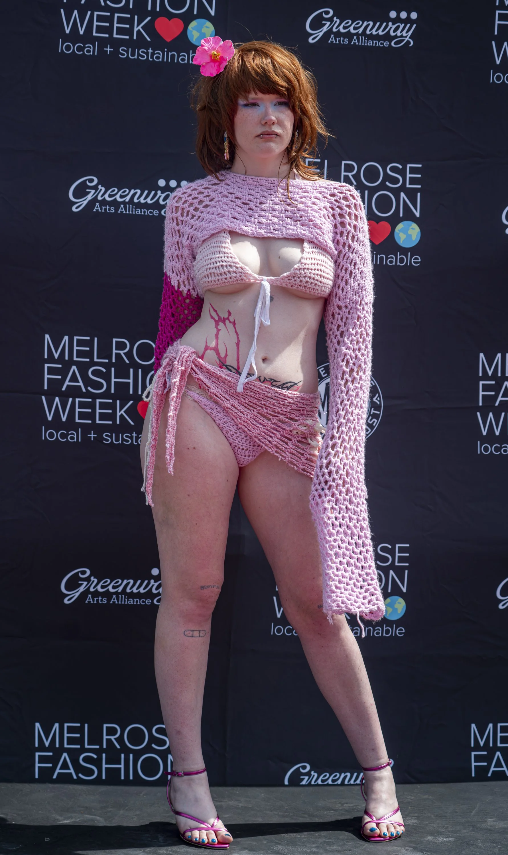  Santa Monica College student Alex Anabella Long strikes a pose on the runway as she models in a design by Santa Monica College Fashion & Design student Erica Perla Jimenez at the second annual Melrose Fashion Week Runway Show this was Jimenez's time