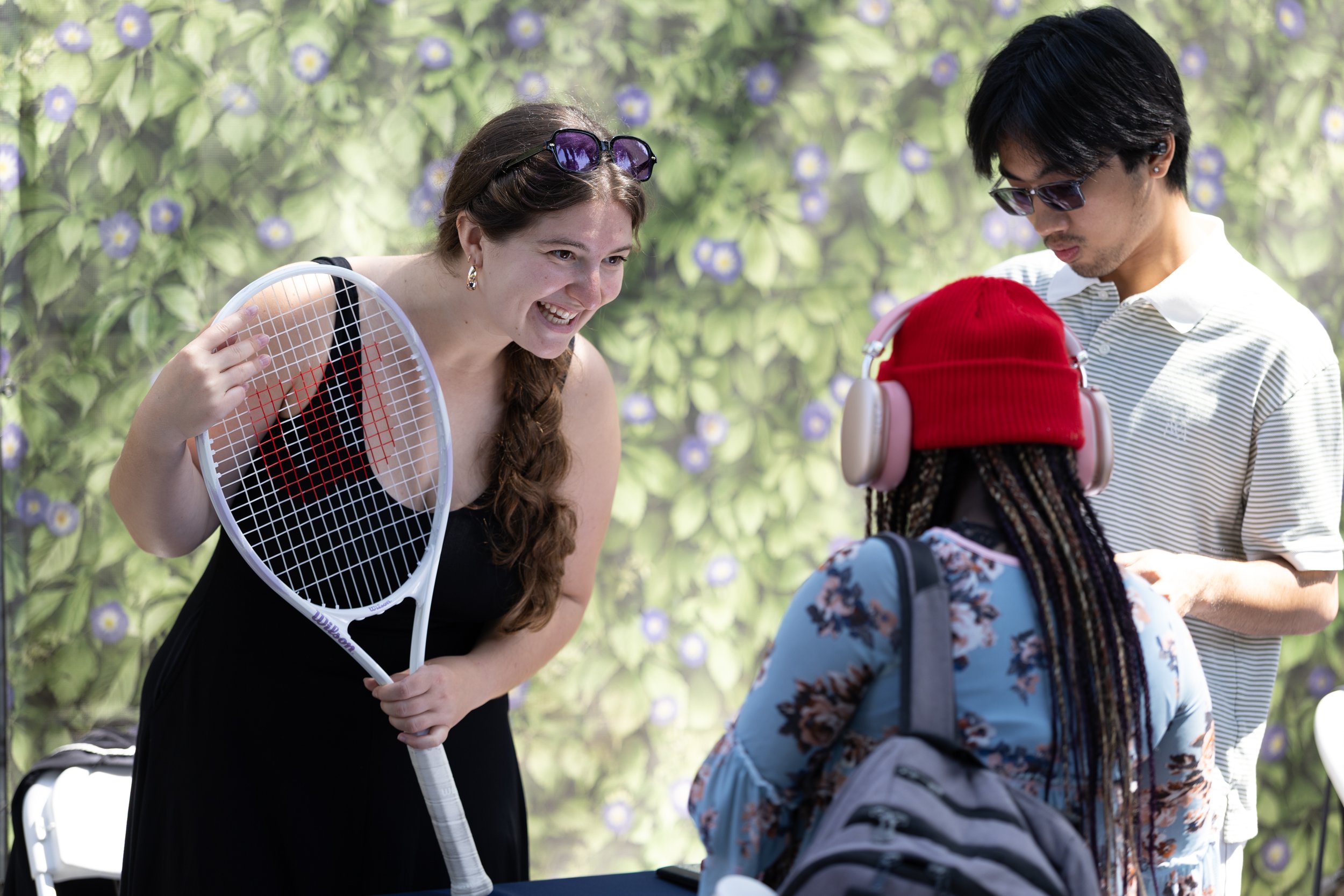  Elizabeth Imenowskay, a psychology major and Santa Monica College (SMC) tennis club member, speaks with Awele Ajie-Anozie alongside Nay Soe, club secretary and interior design major, during the Santa Monica College (SMC) Club Awareness event on the 