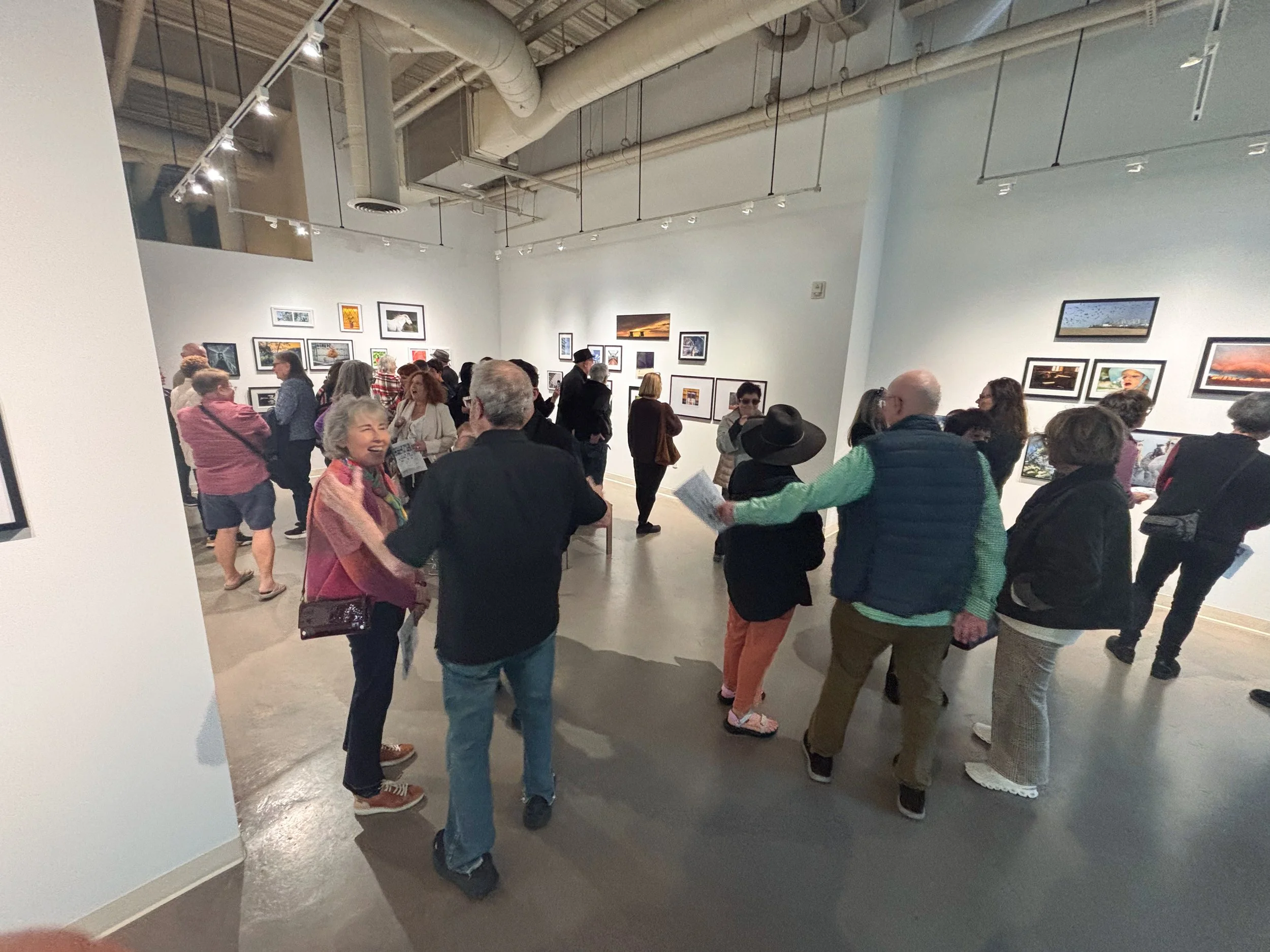 A crowd of people at the 2026 Annual Student Photography Exhibition at the Santa Monica College Emeritus Art Gallery in Santa Monica on Thursday, March 15, 2026. (Kantapong Wongjirasawad | The Corsair) 