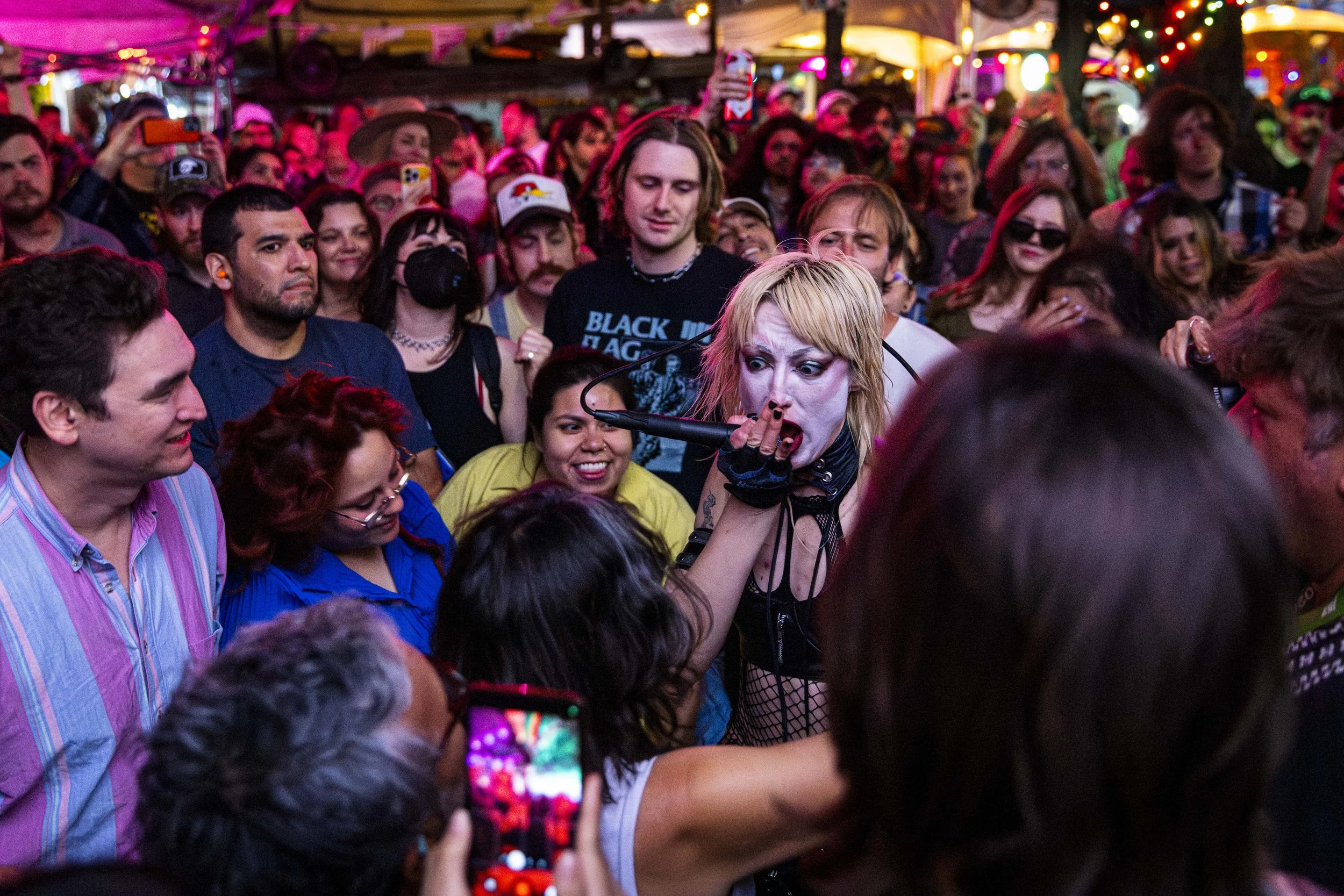  Dusty Lee, of Canadian industrial performance art band Slash Need, sings among the crowd at Hotel Vegas on Sunday, March 15, 2026, in Austin, Texas, during the South by Southwest (SXSW) festival. Due to the redevelopment of the Austin Convention Cen
