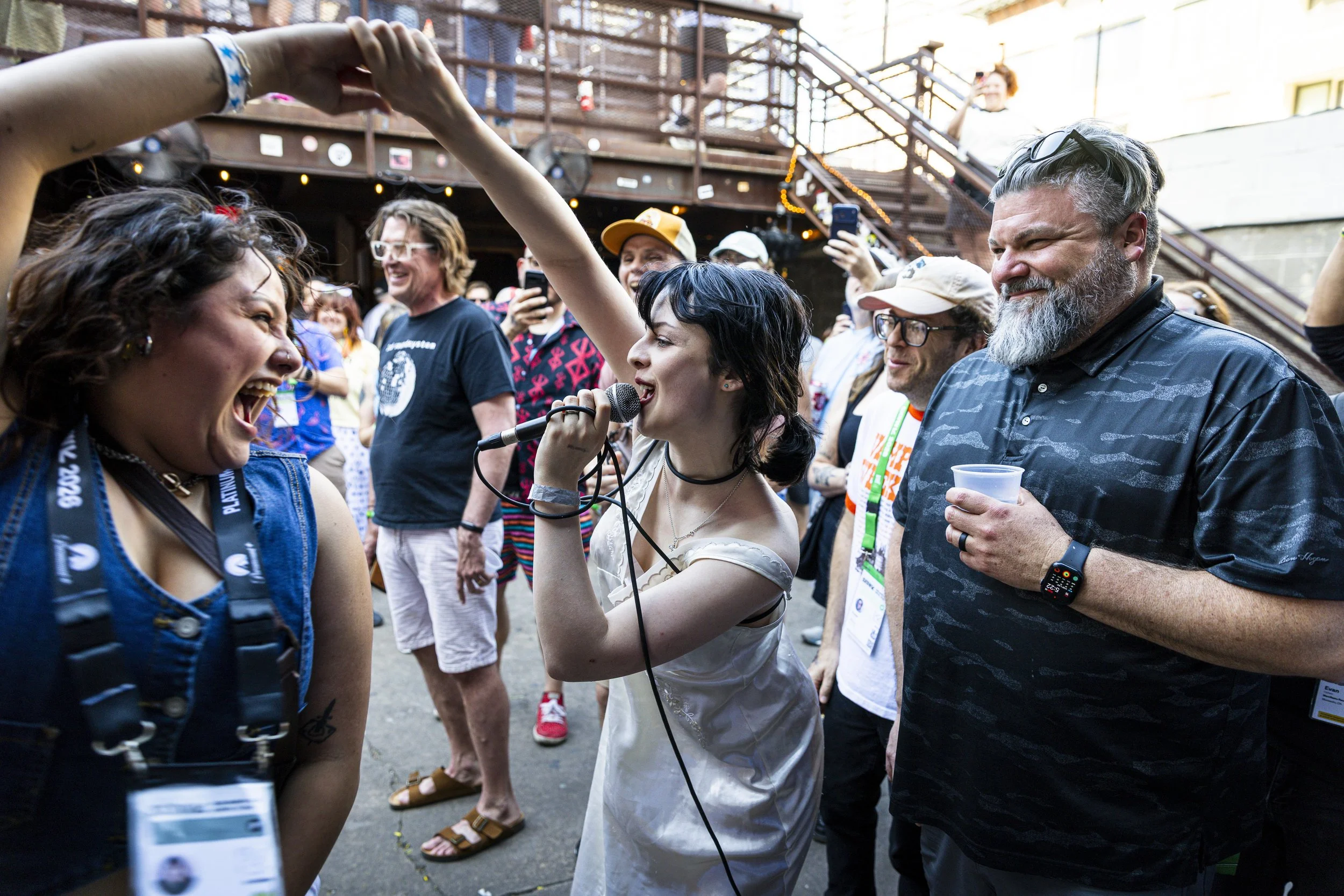  Tasmin Nicole Stephens, also known as TTSSFU, an English singer-songwriter and guitarist, dances with a fan while singing at Mohawk on Sunday, March 15, 2026, in Austin, Texas, during the South by Southwest (SXSW) festival. Due to the redevelopment 